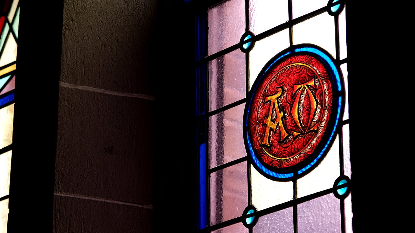Alpha Omega stained glass