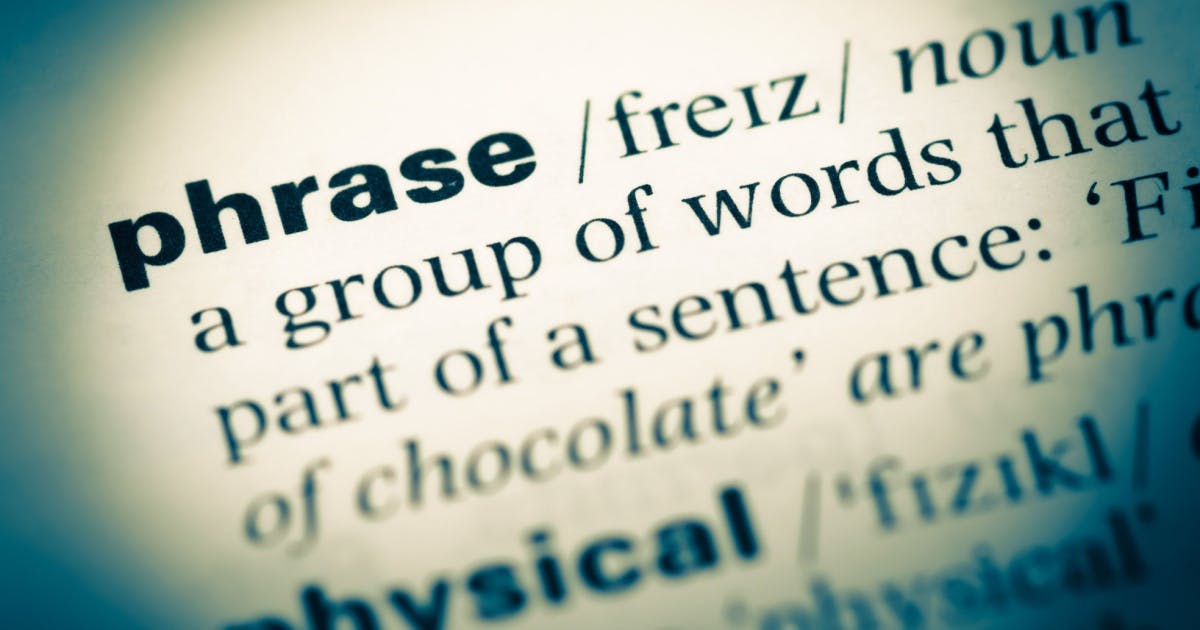 Páginas de um dicionário com expressões em inglês e definições destacadas.