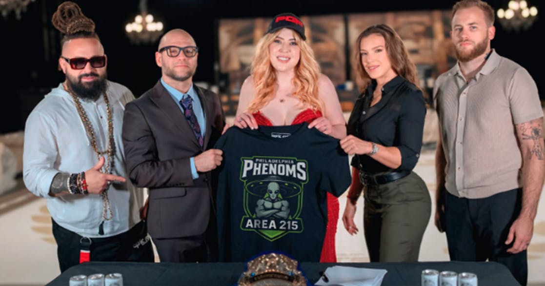 Lauren Barone is featured with the owners of the PGF in a photo showcasing her historic purchase of the team.