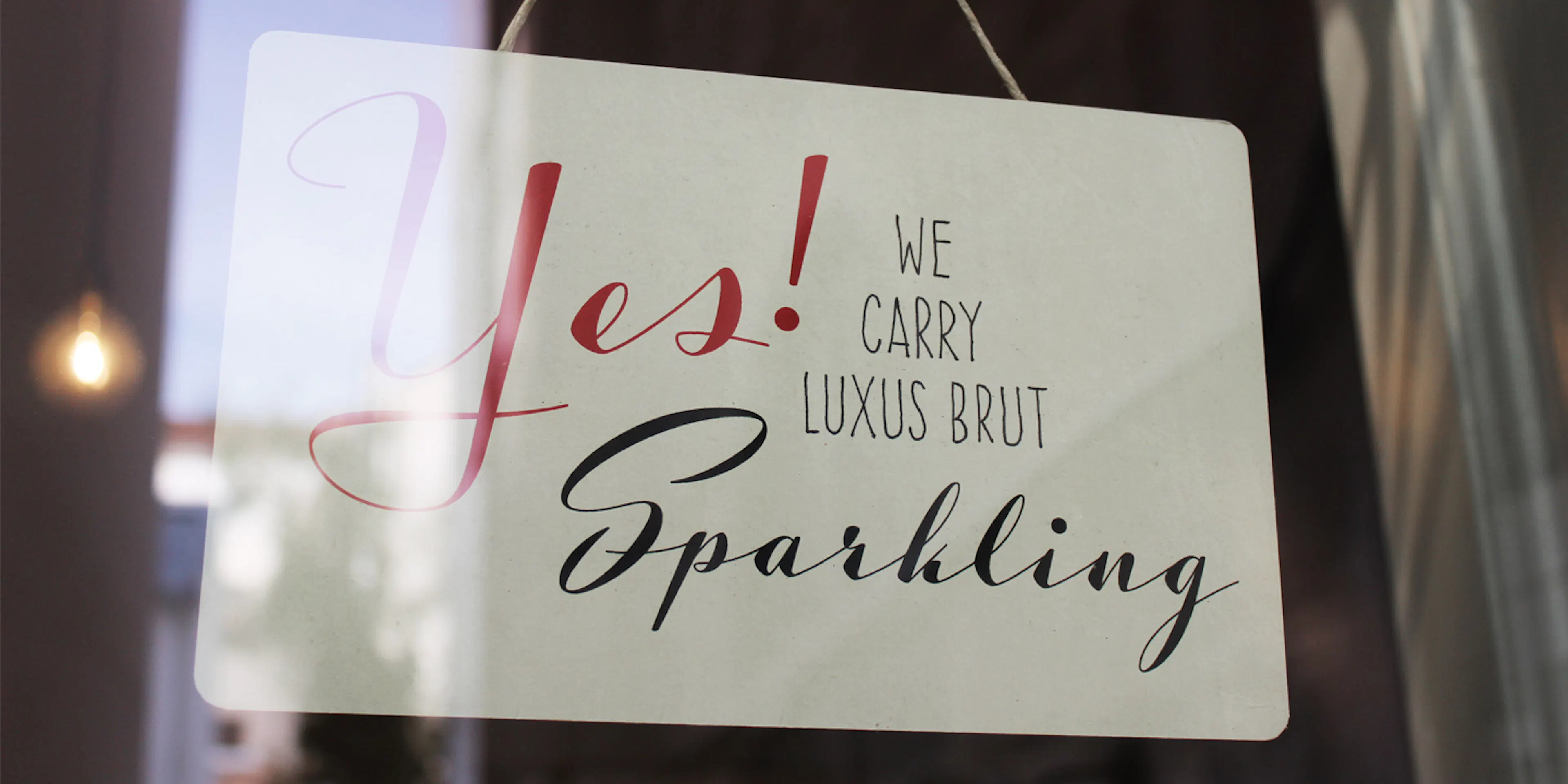 Sample use of Luxus Brut Sparkling Font in a shop window