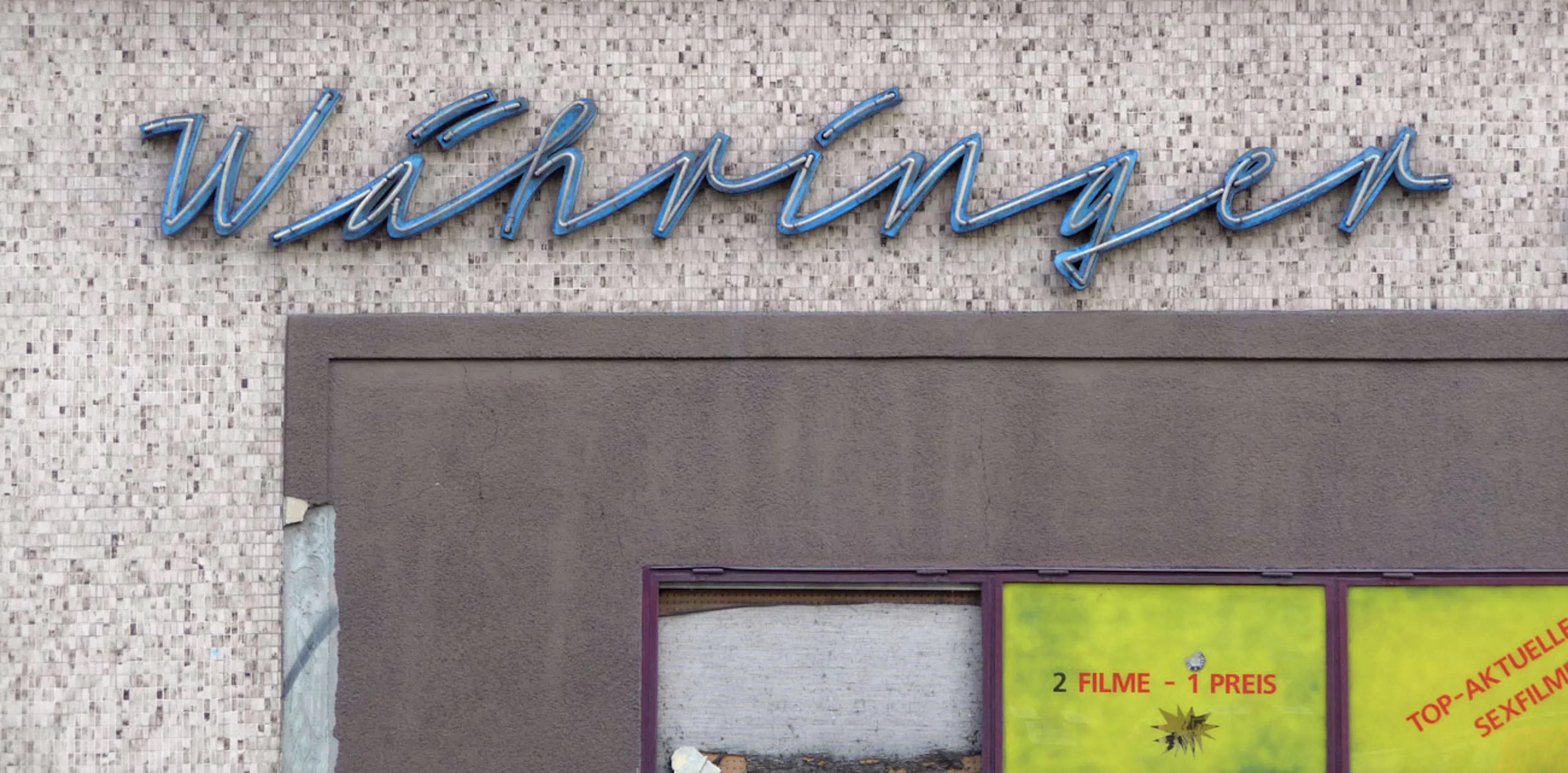 Neon lettering of a cinema in Vienna that inspired the design of Neonoir Font