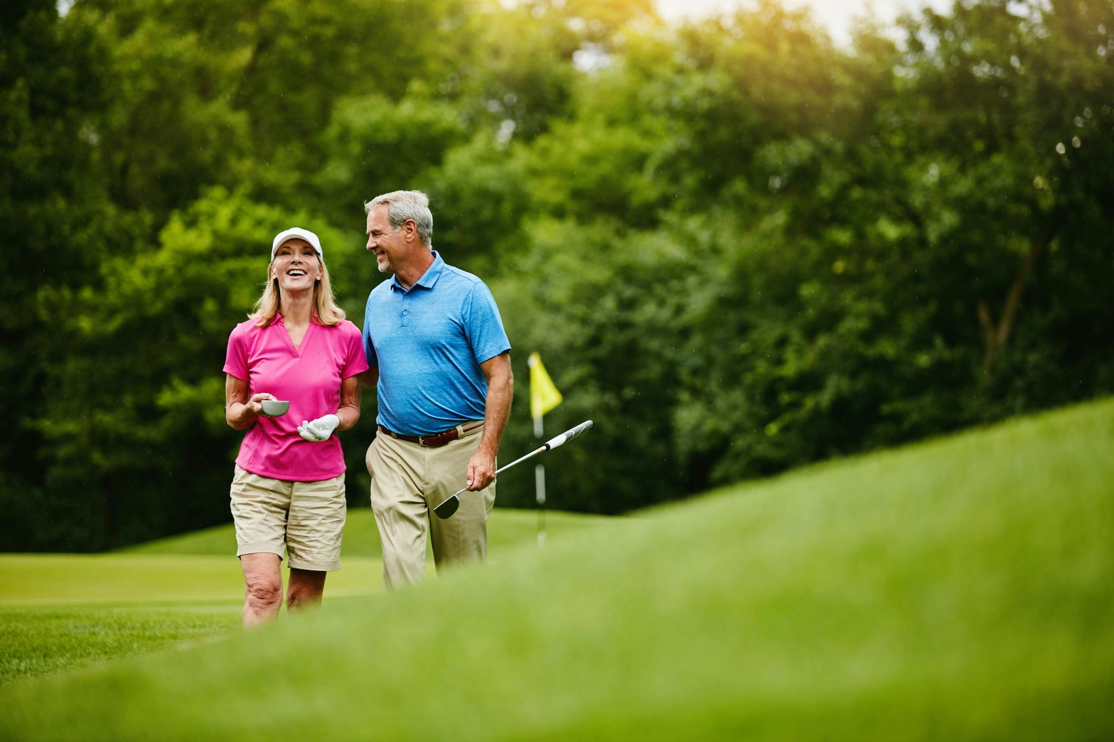 couple golfing