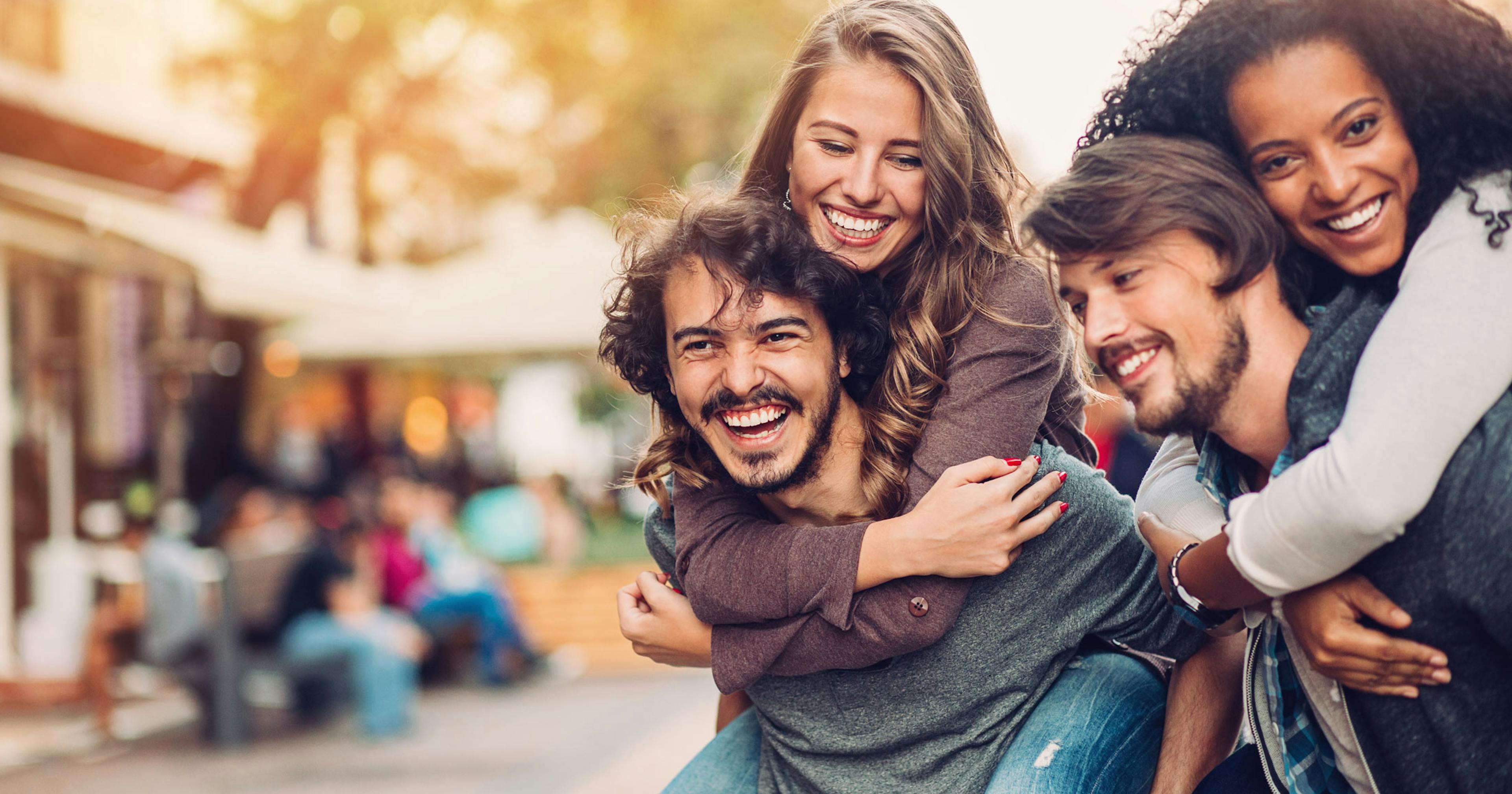 Happy couples out in the city.