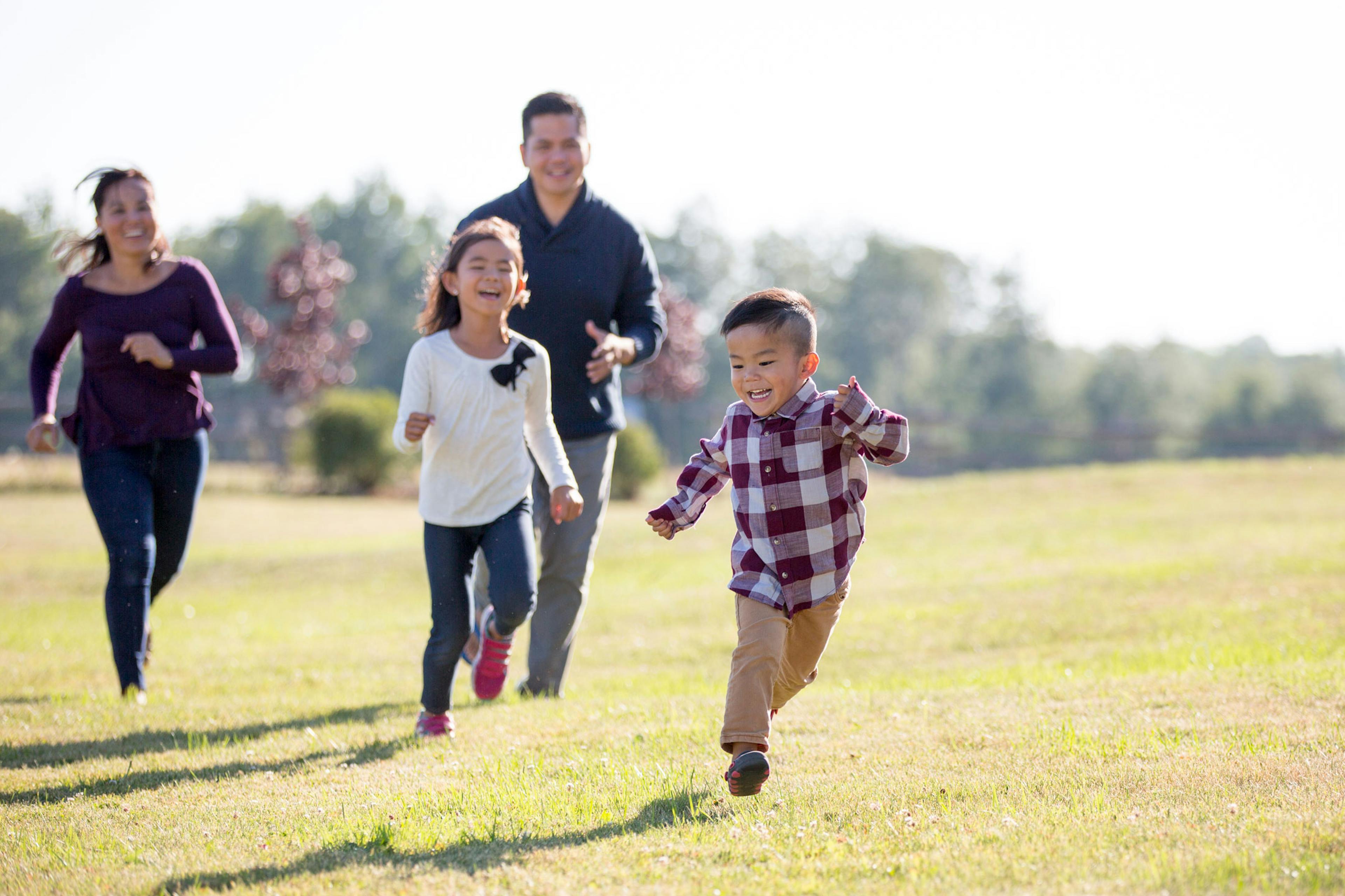 family spending time together outside.