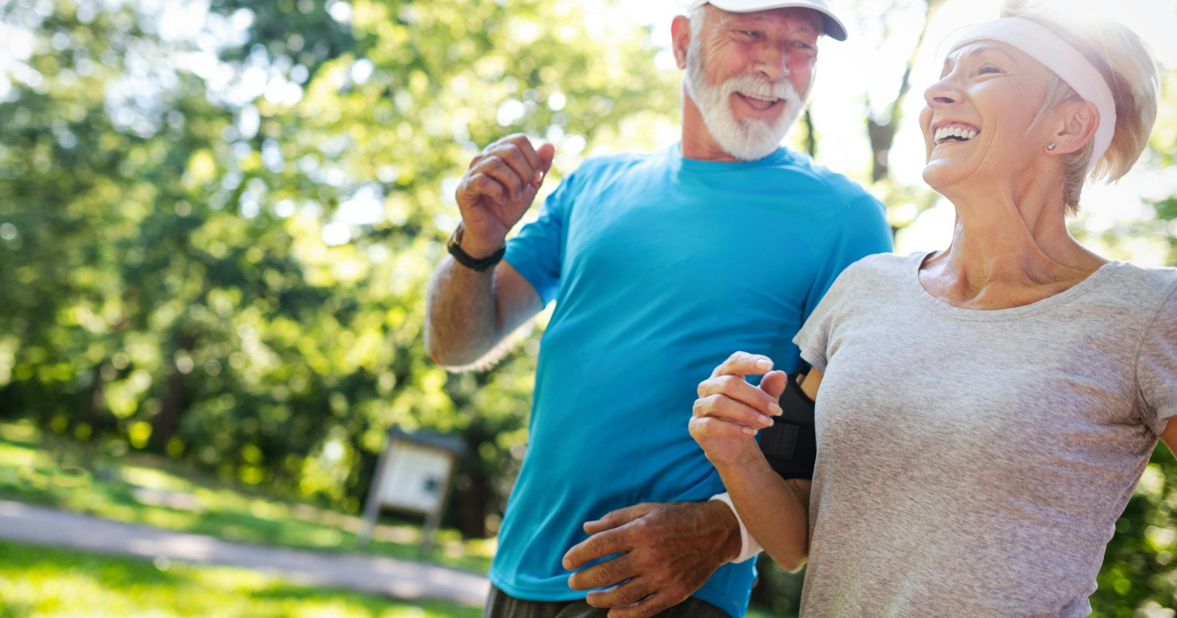 beautiful and healthy older couple exercising