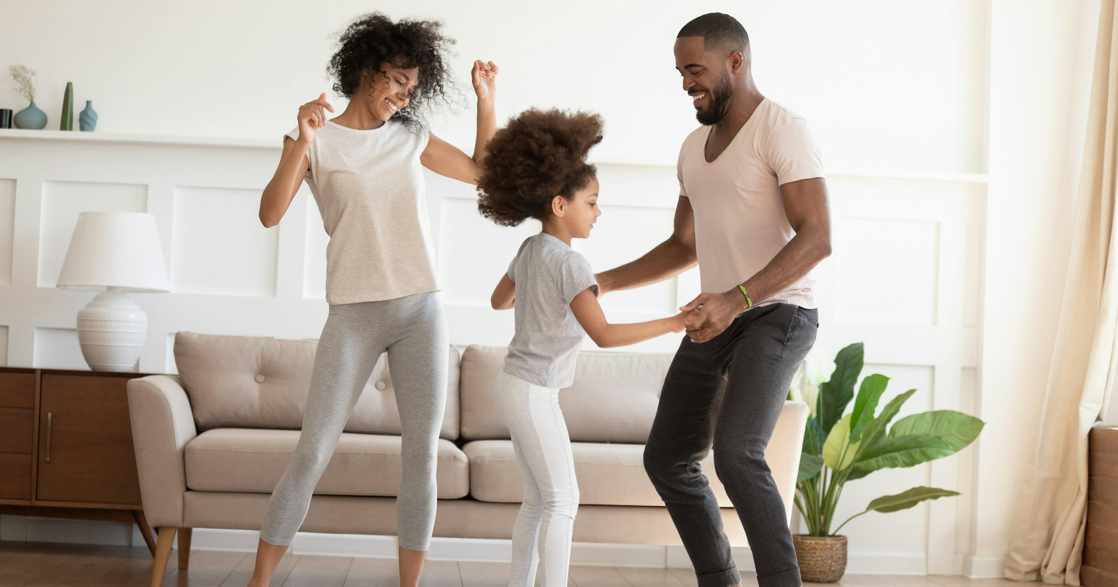 family having fun dancing