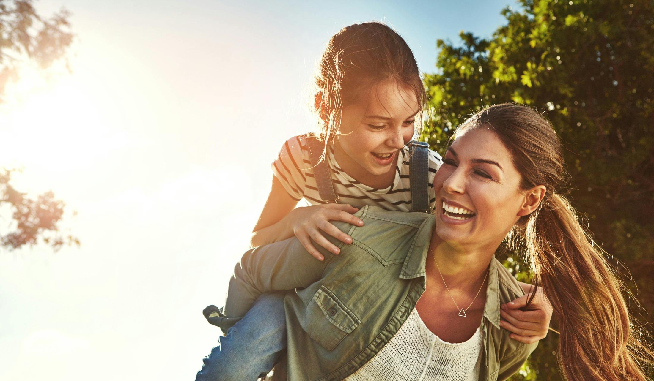 mom and daughter in the sunlight