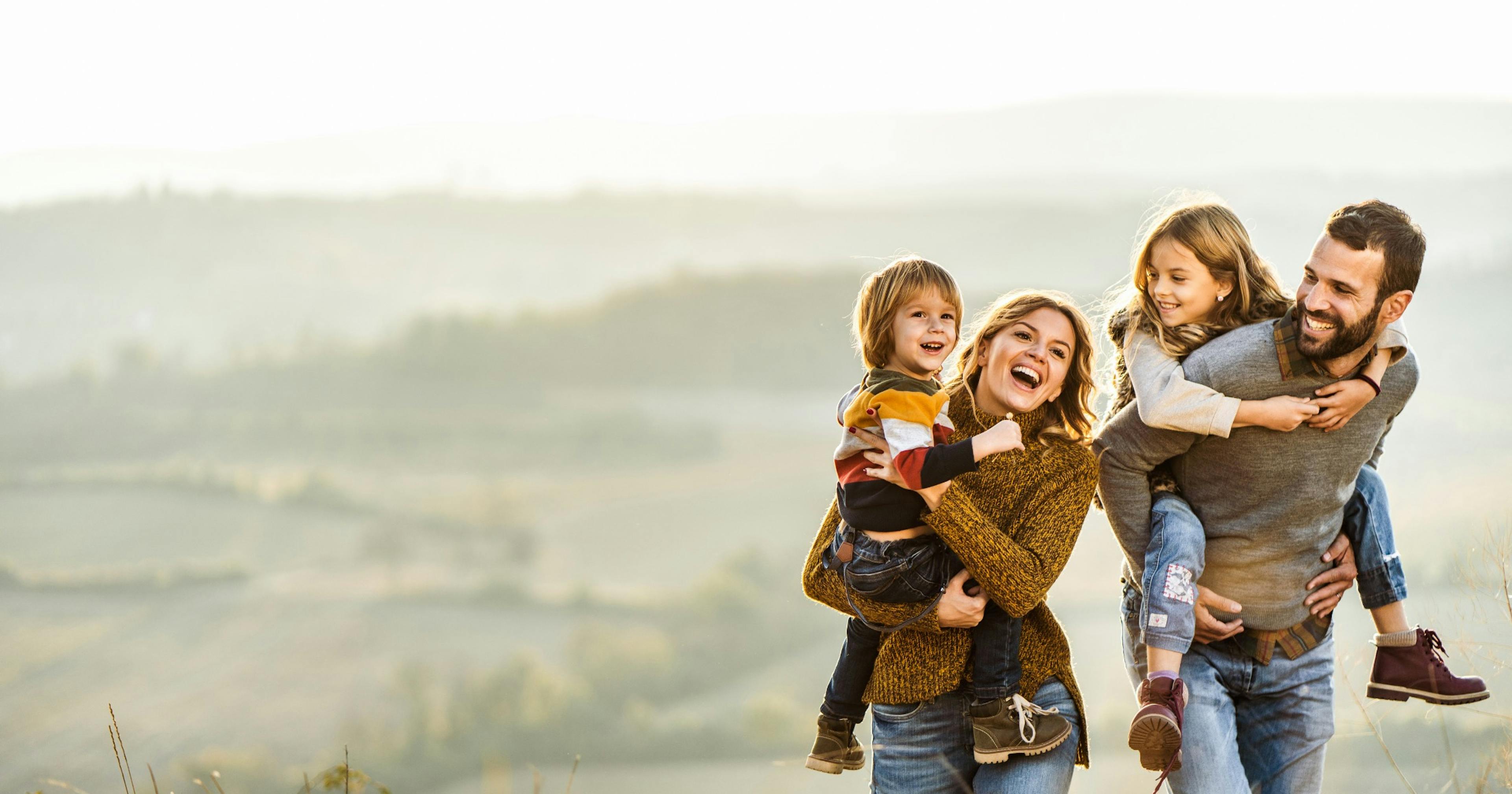 young happy family out exploring