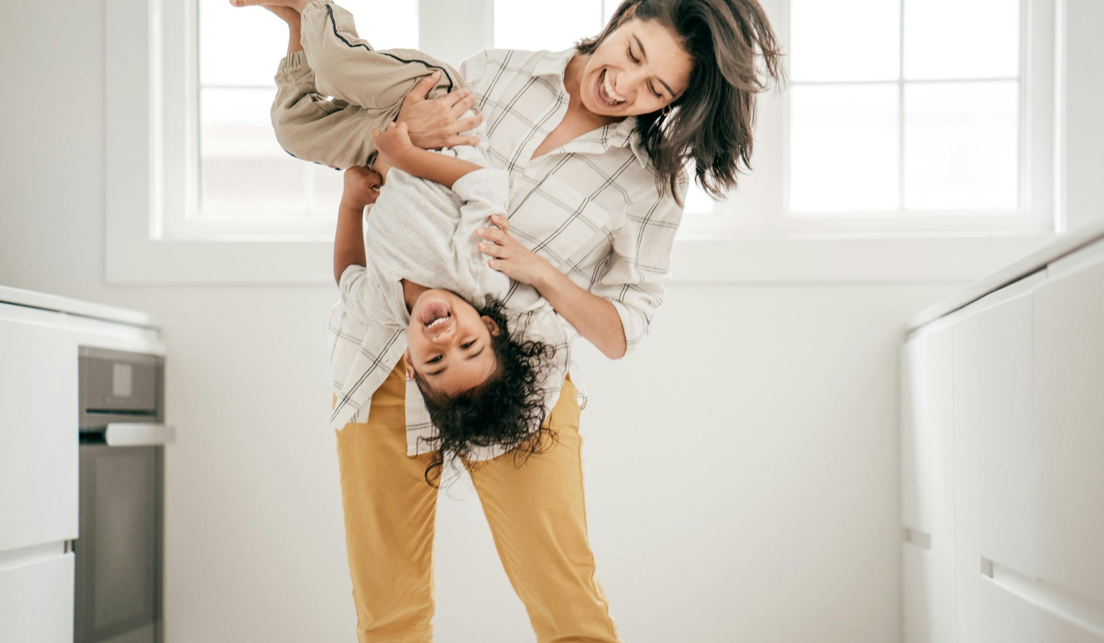 mom and toddler playing