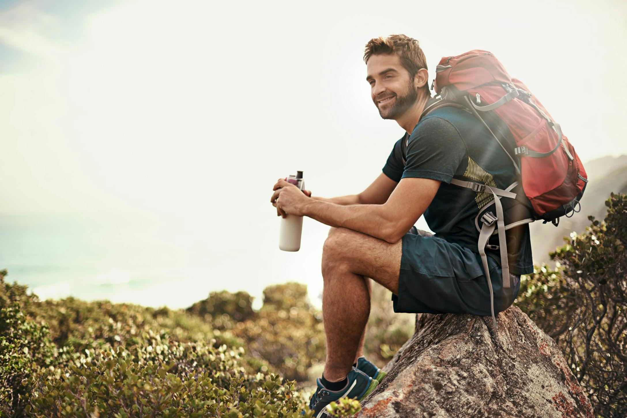 fit man drinking water
