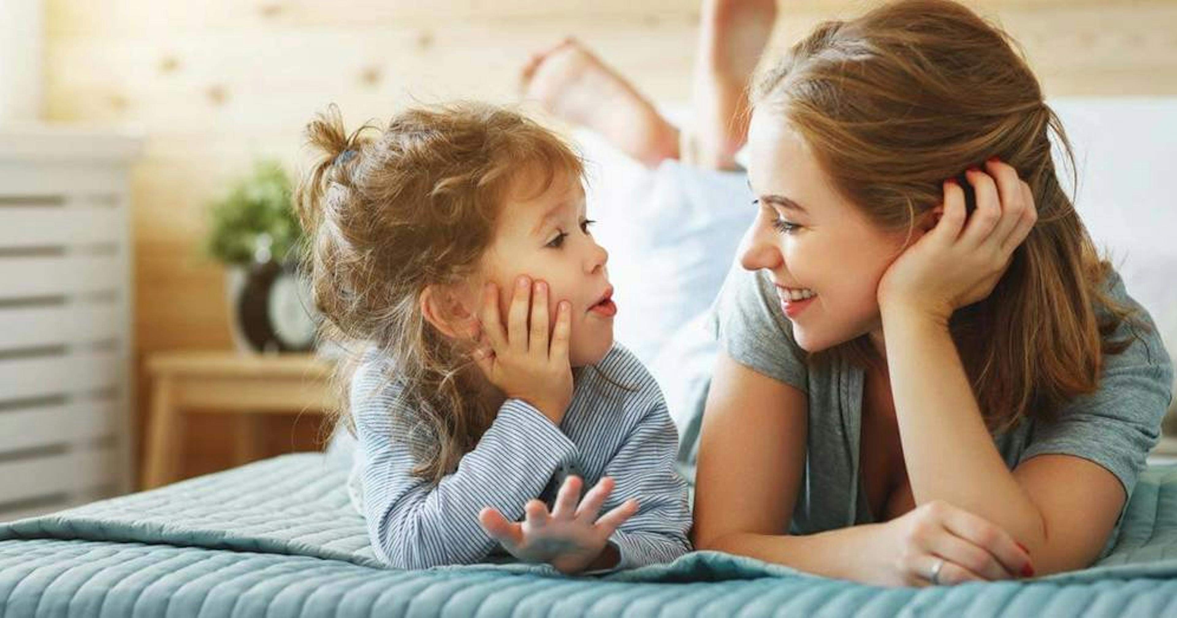 happy mom and daughter at home