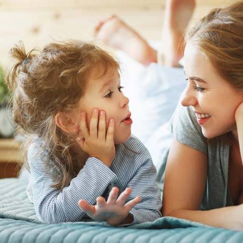 happy mom and daughter at home