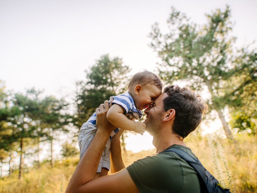 baby boy with dad in nature
