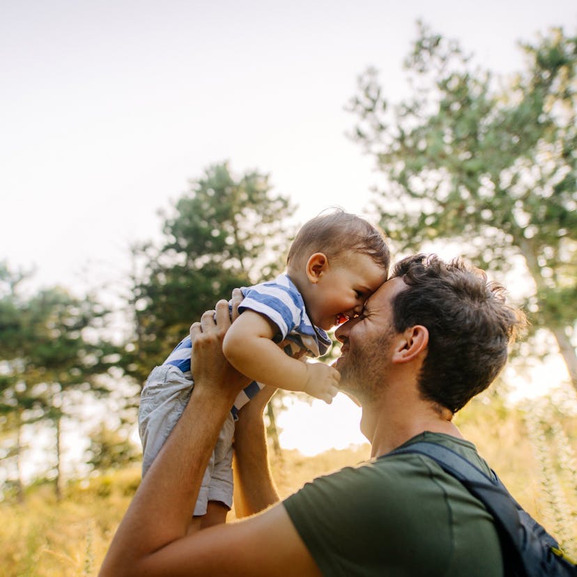 baby boy with dad in nature