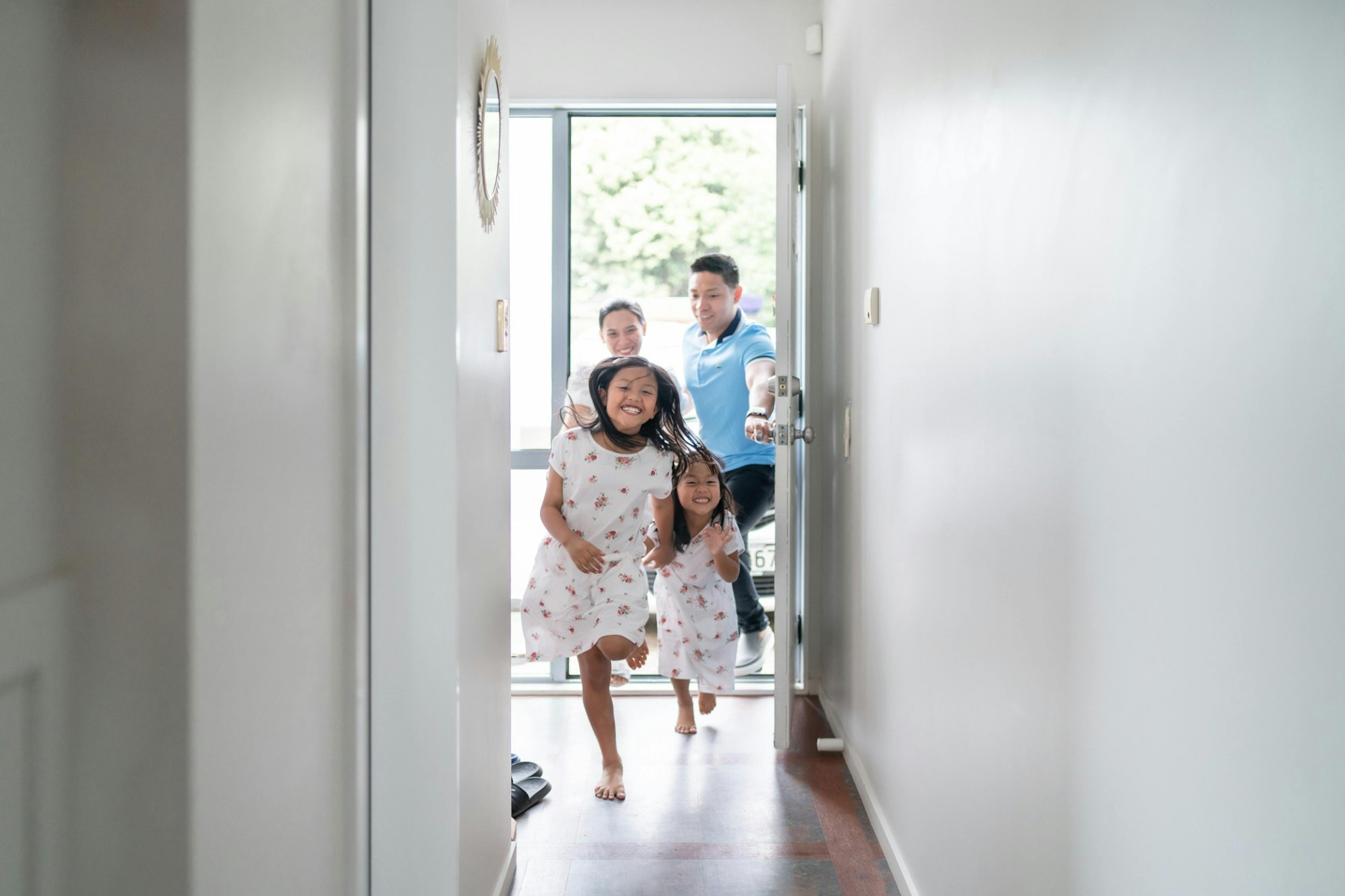 family arriving back at home