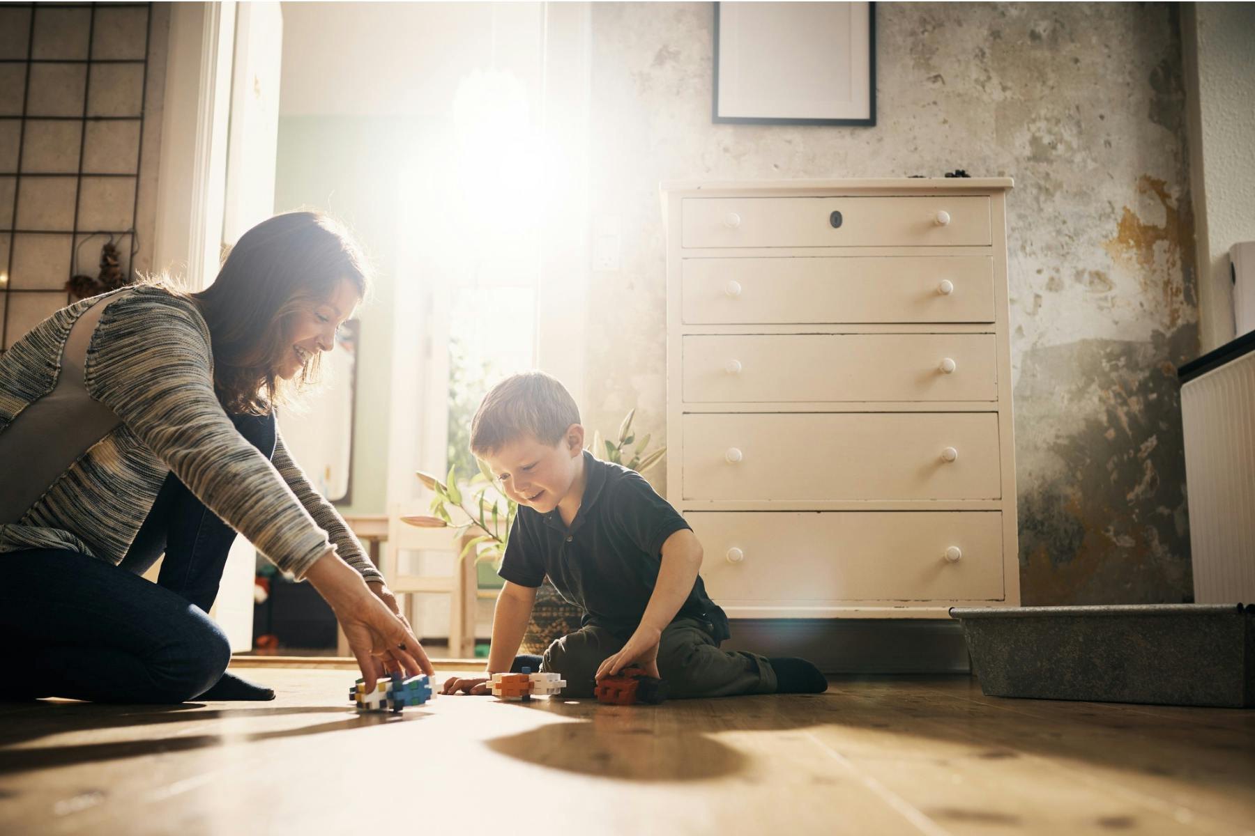 mom and son playing and learning