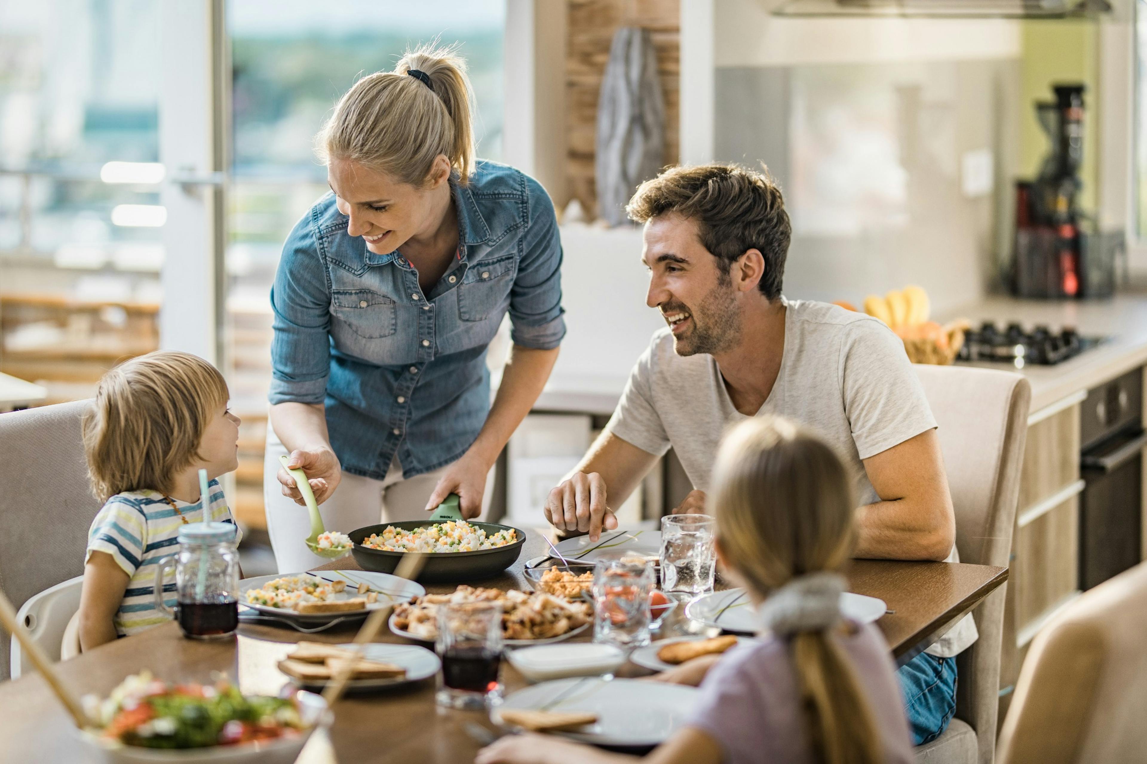 happy family eating dinner