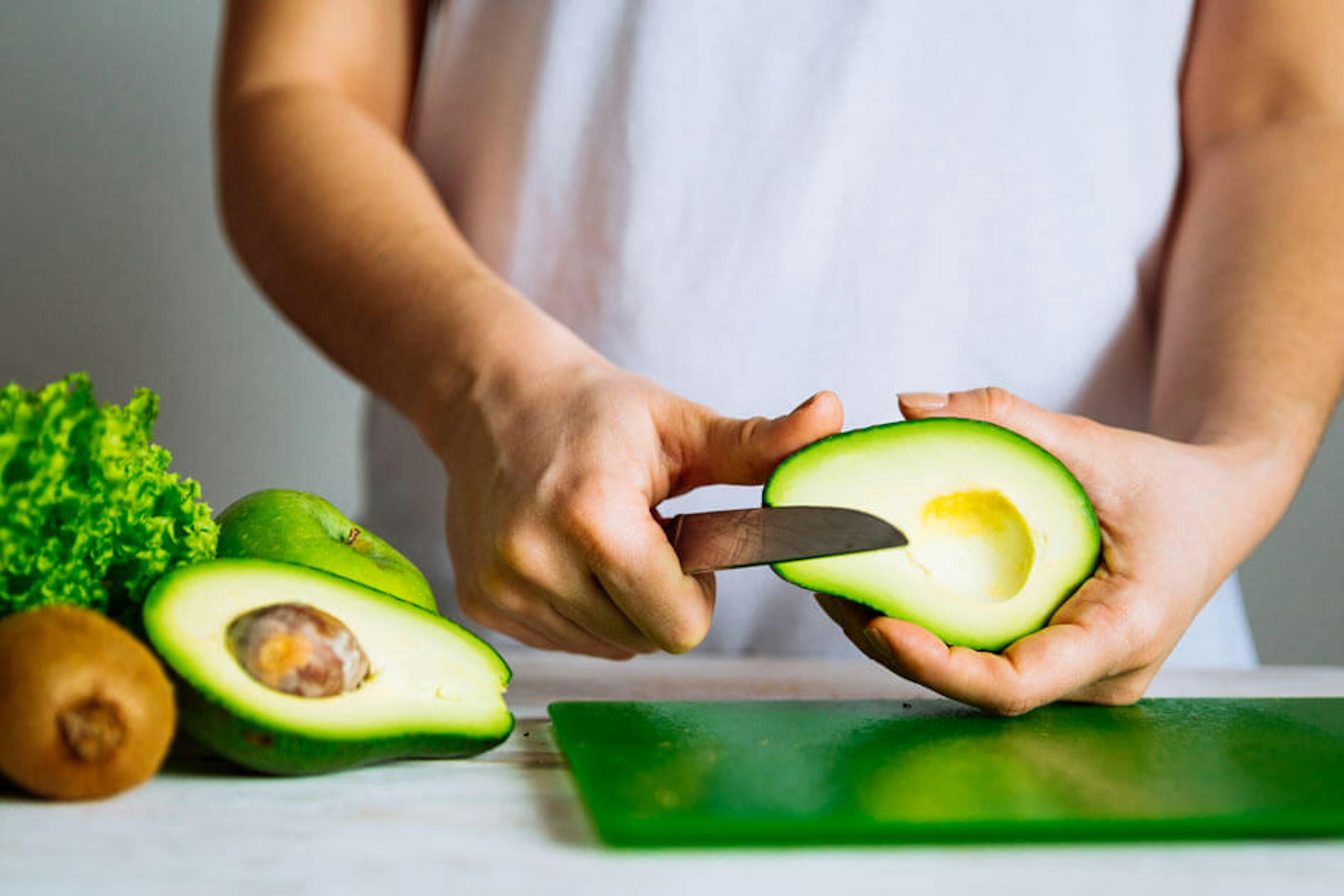 cutting an avocado