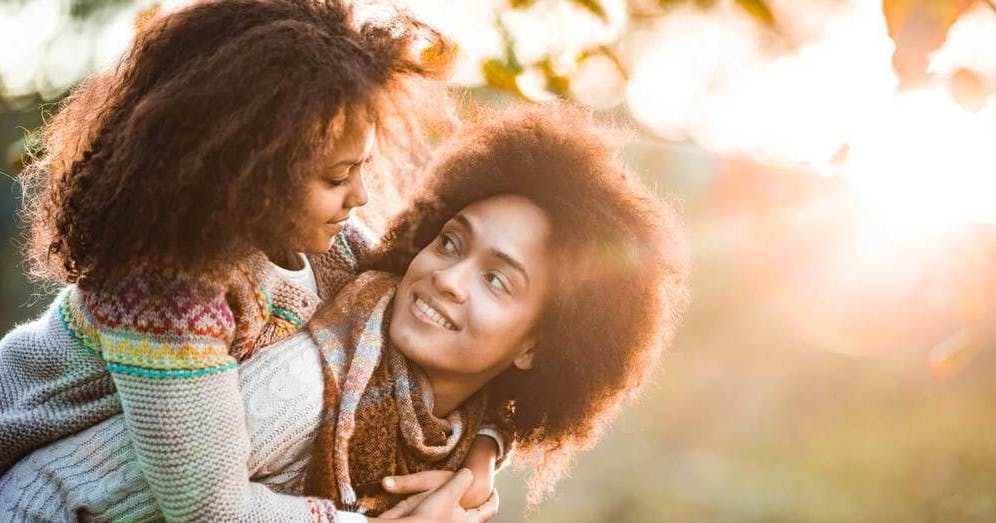 mom and daughter outdoors
