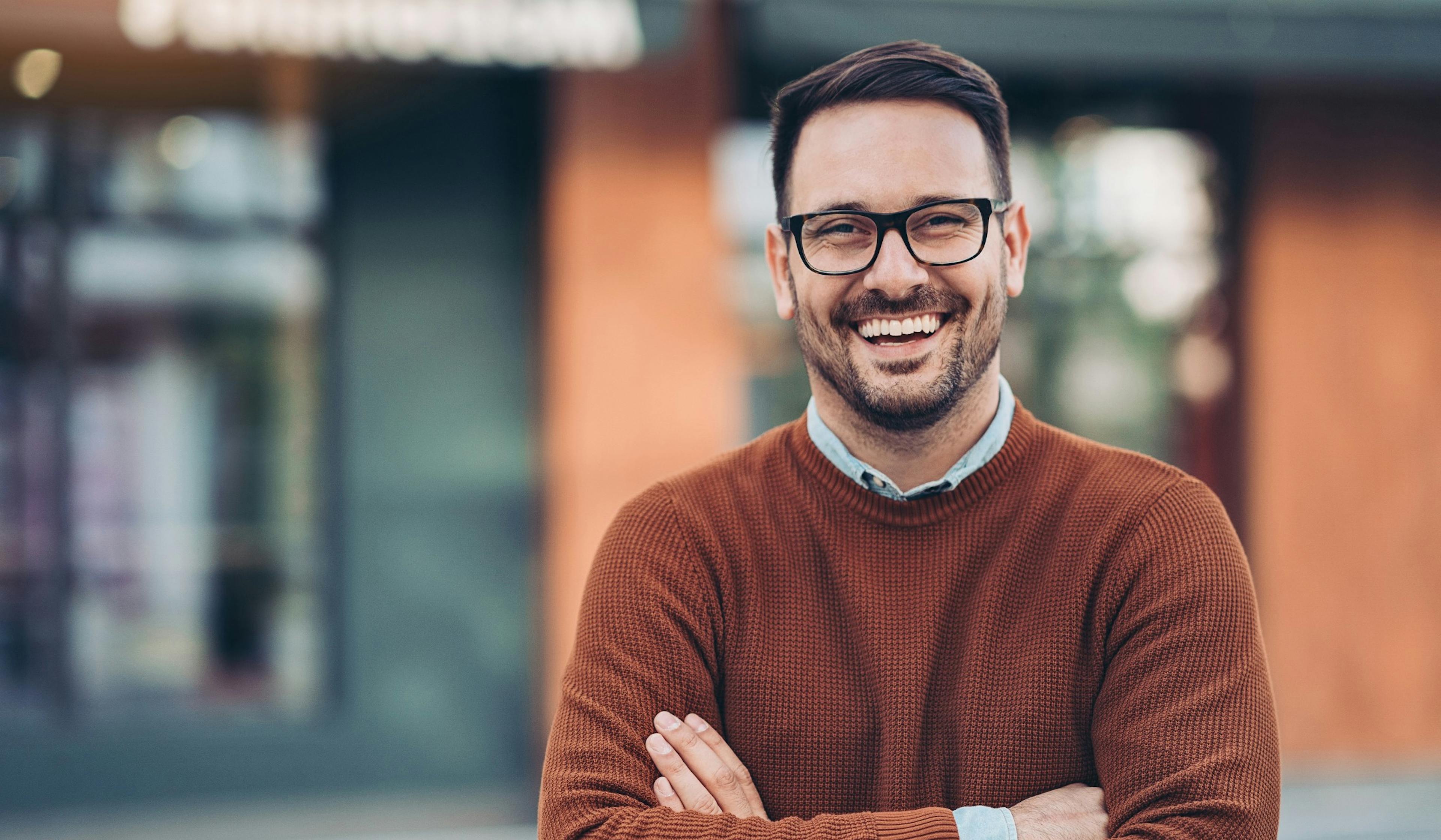 smiling man outside