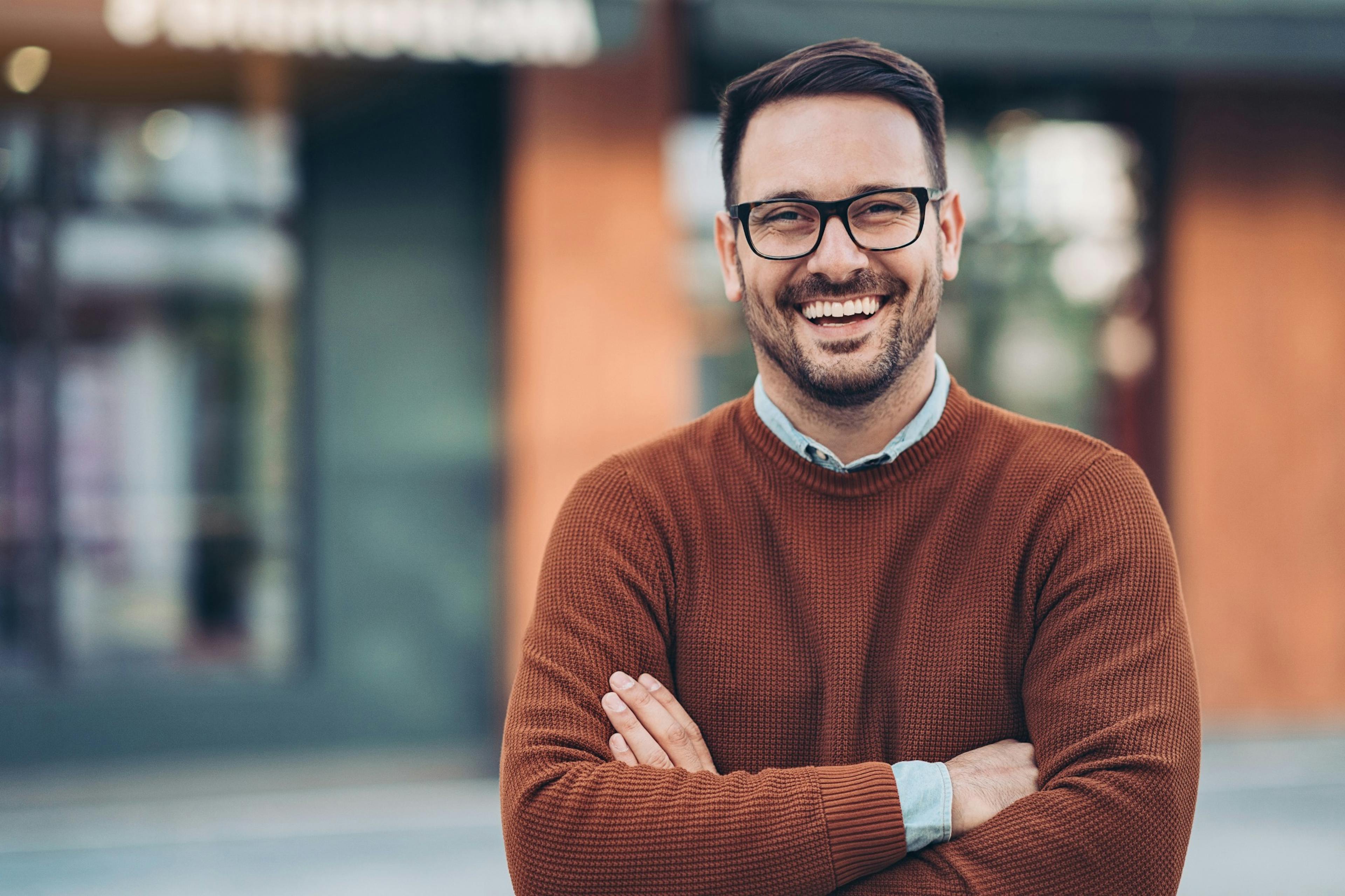 smiling man outside