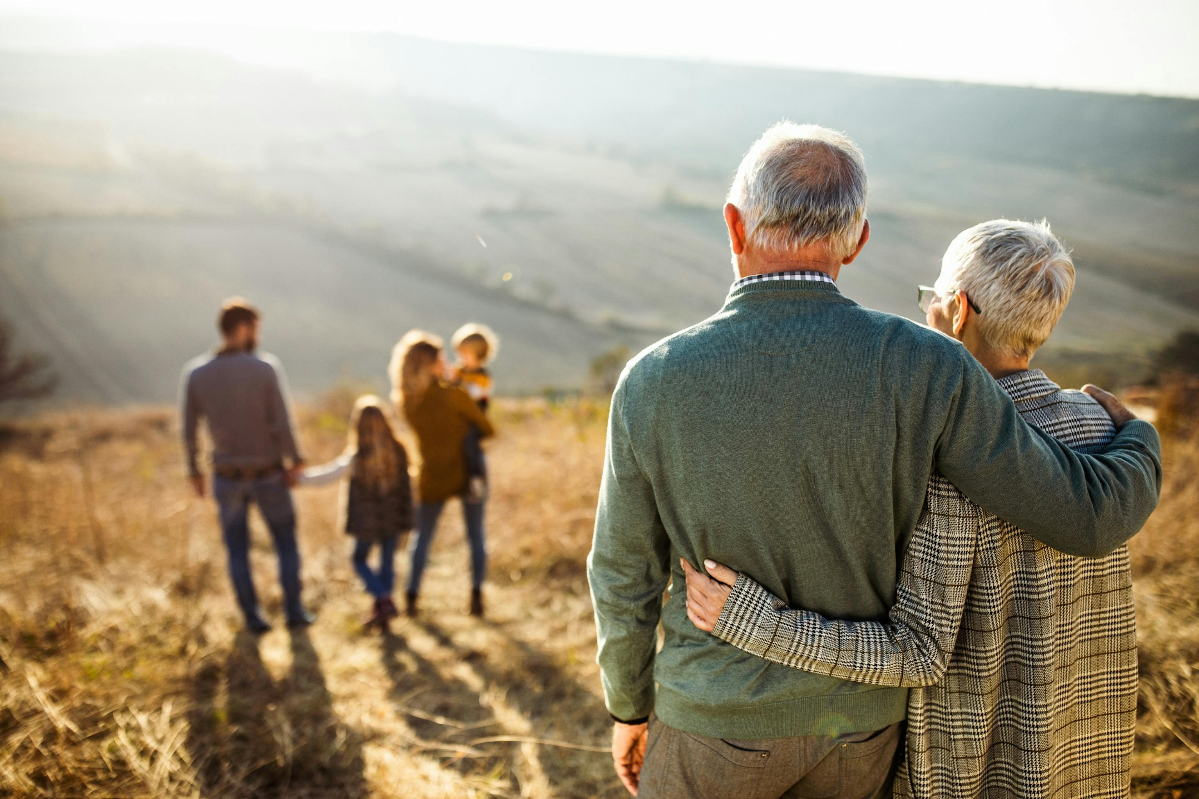 grandparents watching their kids and grandchildren