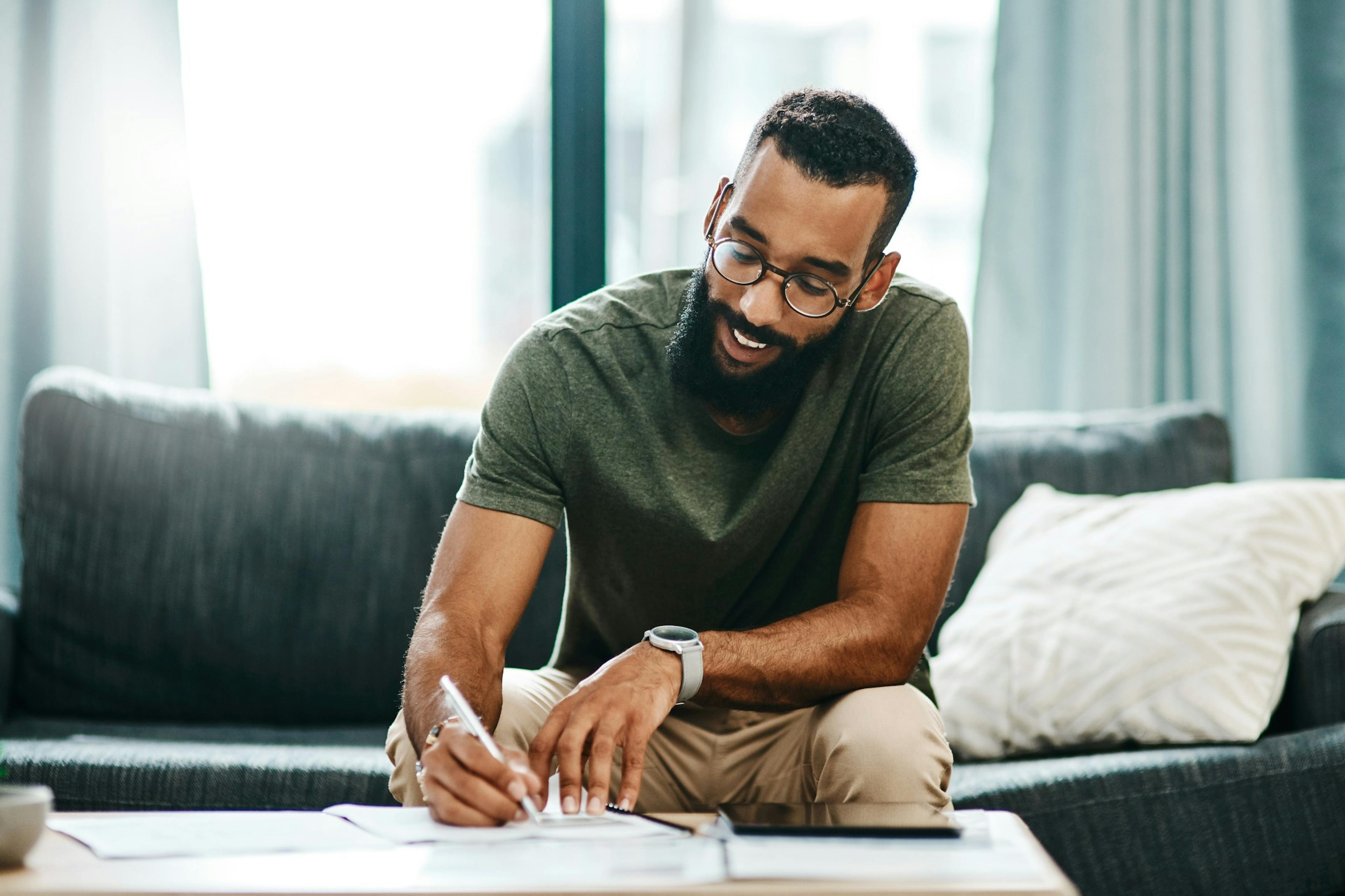 happy man taking notes