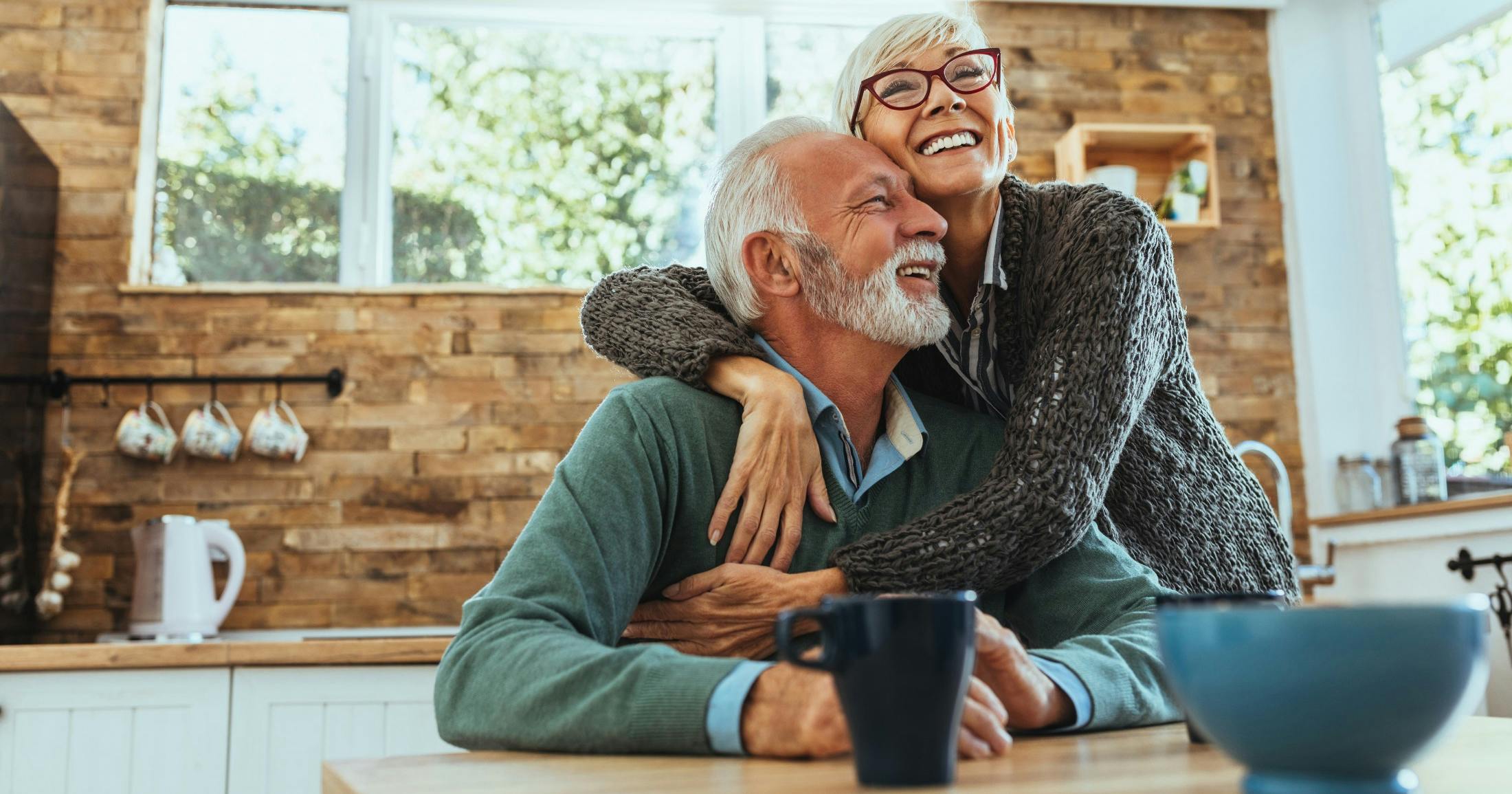 happy older couple in kitchen