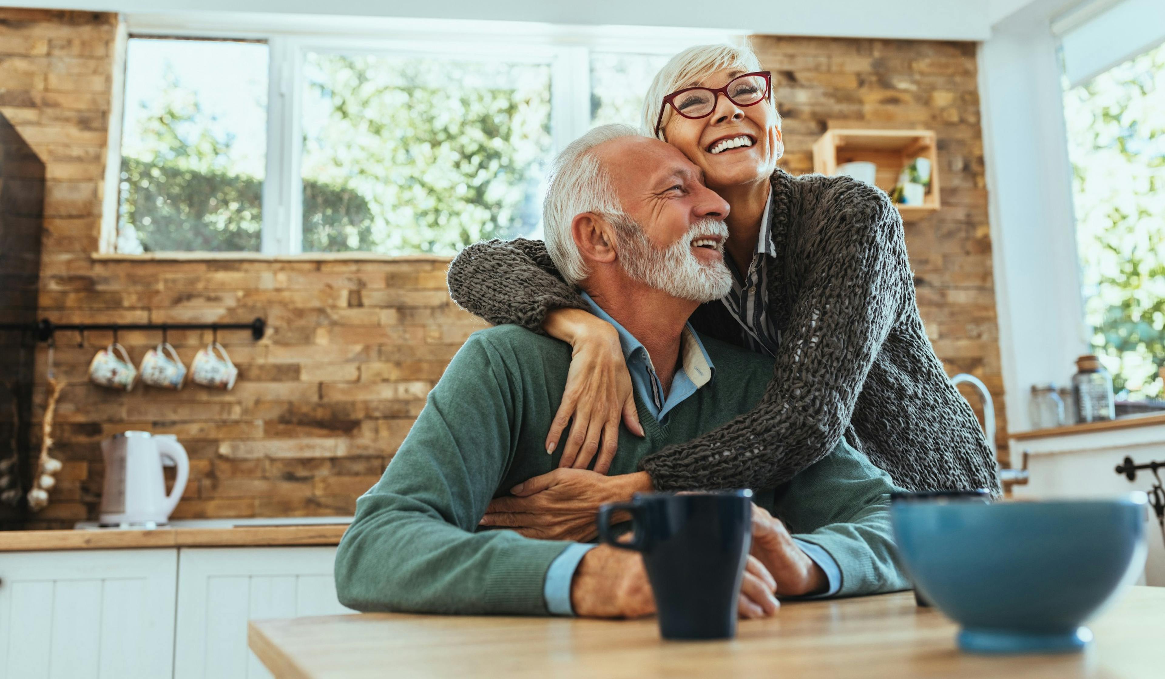 happy older couple in kitchen