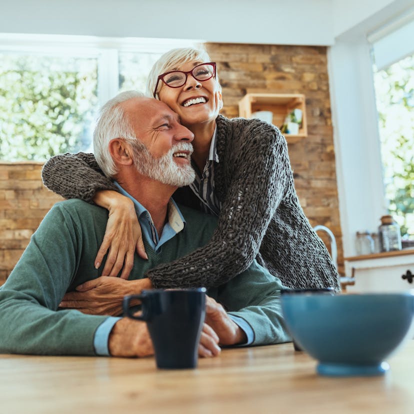 happy older couple in kitchen