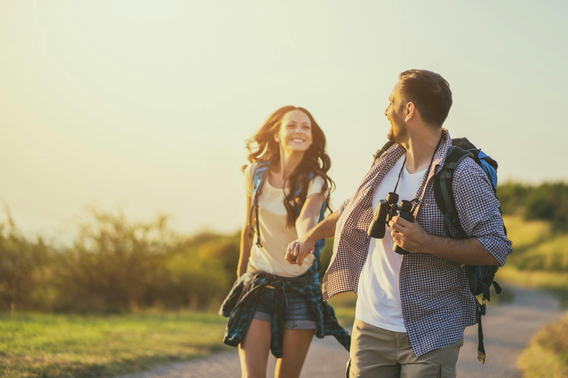 happy couple outside on a hike