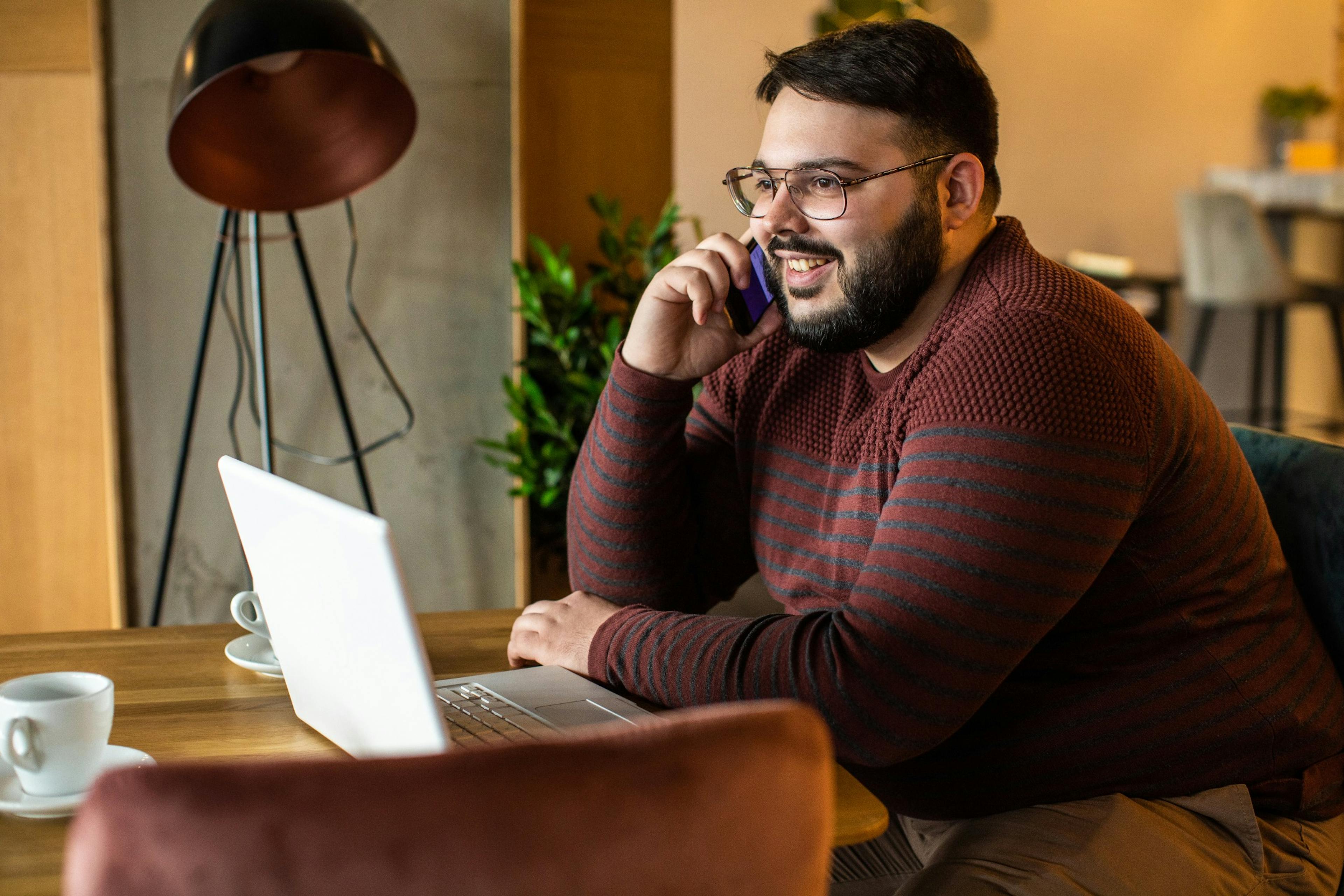 overweight businessman on the phone