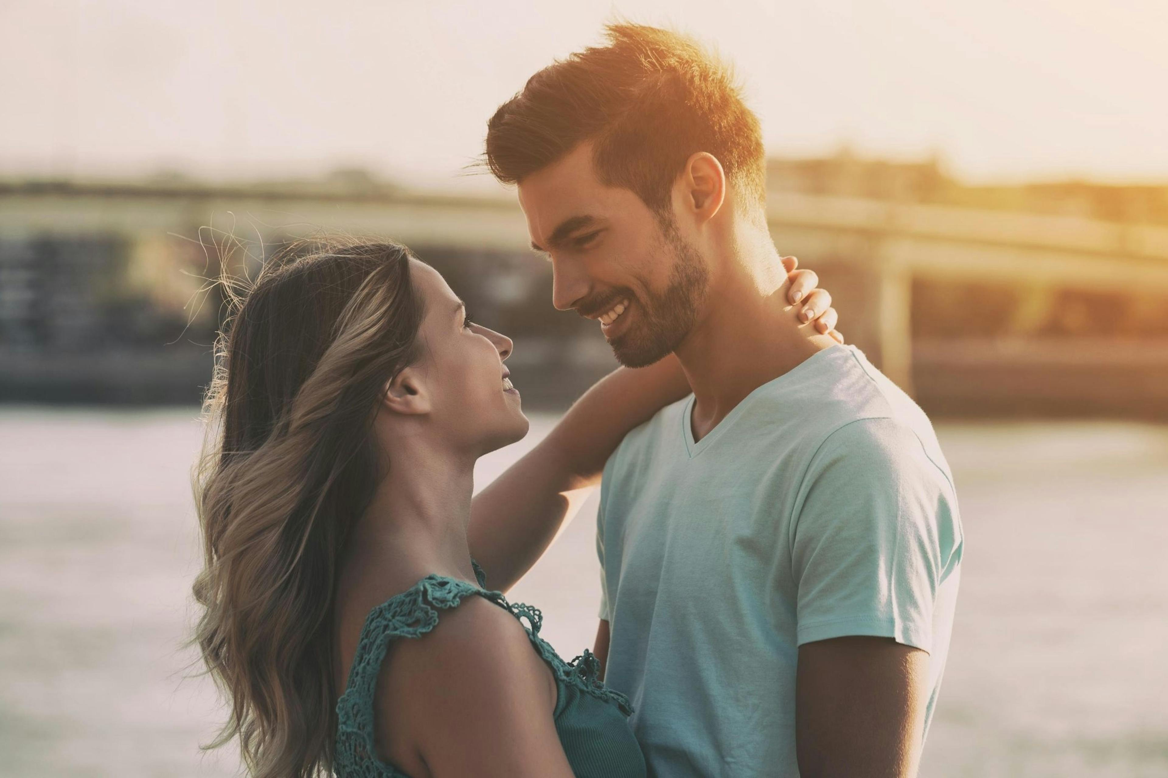 Happy couple at sunset