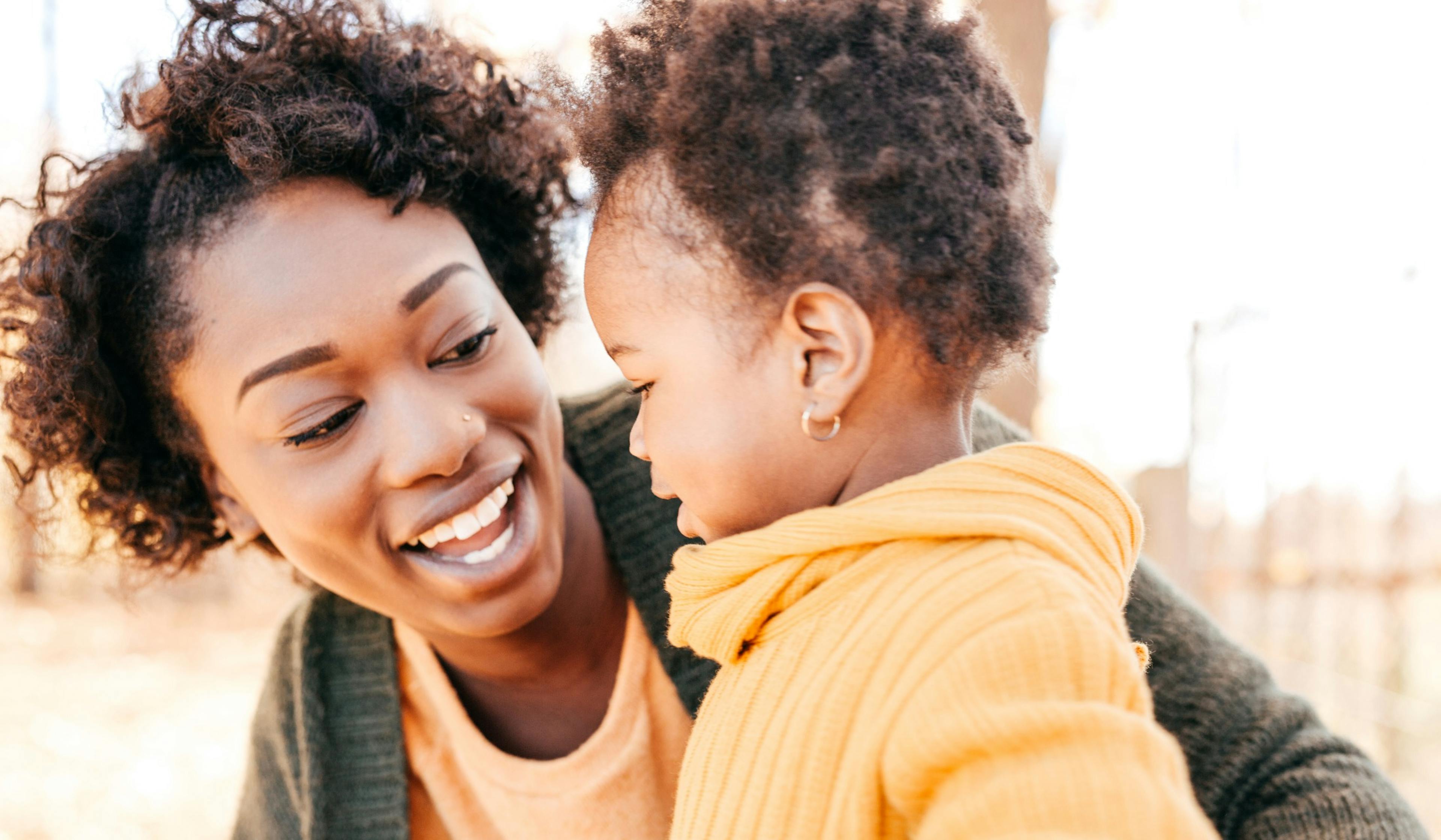 mom and toddler having fun