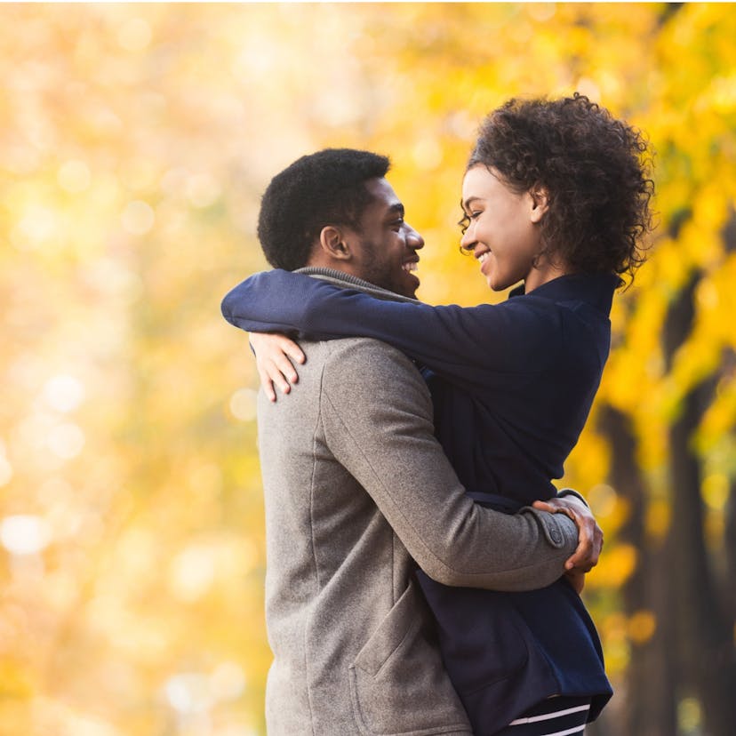 loving couple hugging and looking into each other's eyes