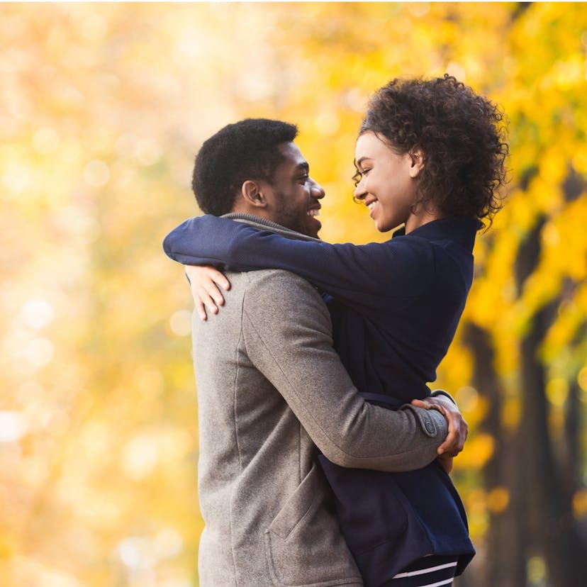 loving couple hugging and looking into each other's eyes