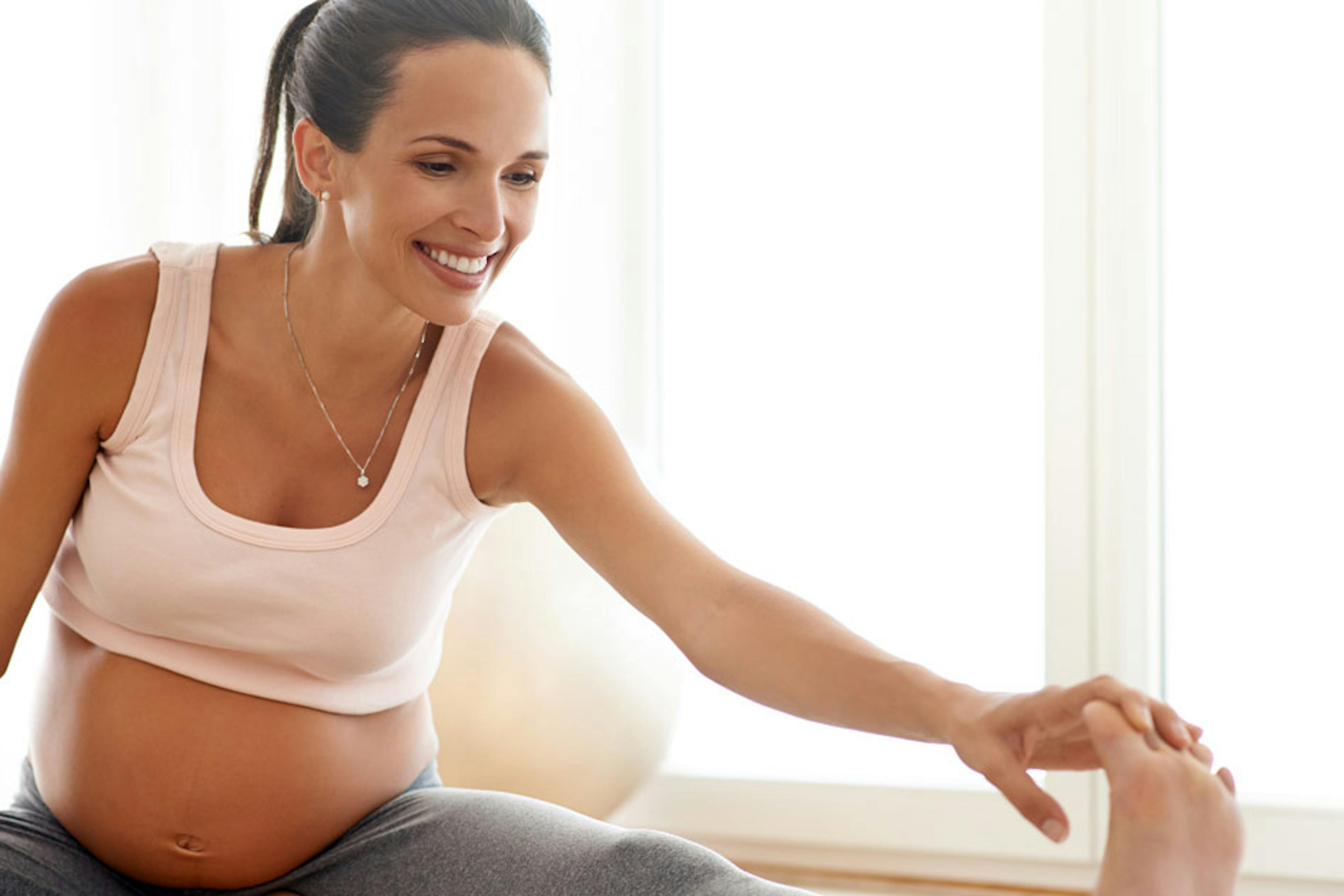 pregnant woman stretching