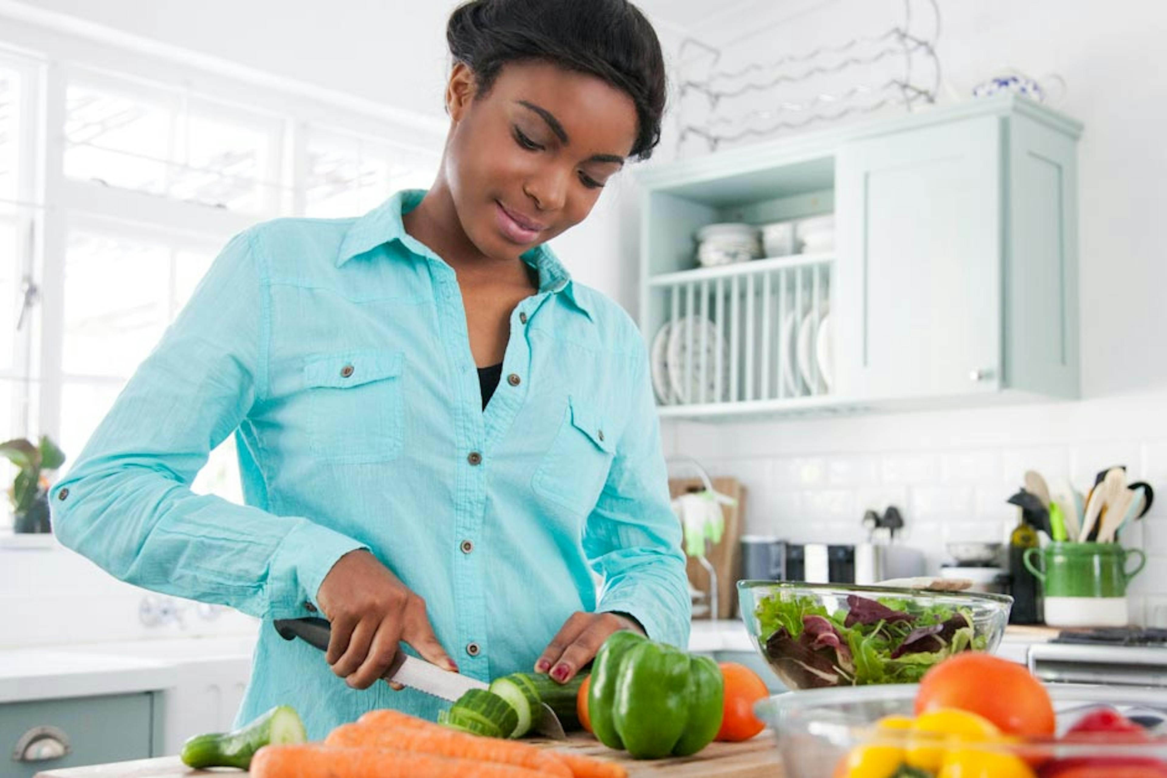 woman preparing healthy veggies