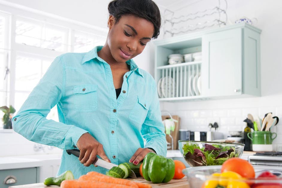 woman preparing healthy veggies