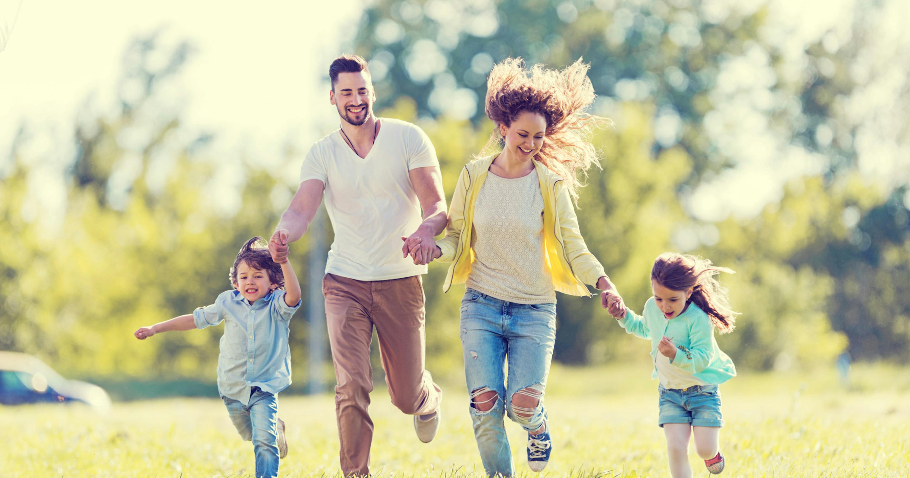 A Happy, Healthy Family Enjoying Sunshine