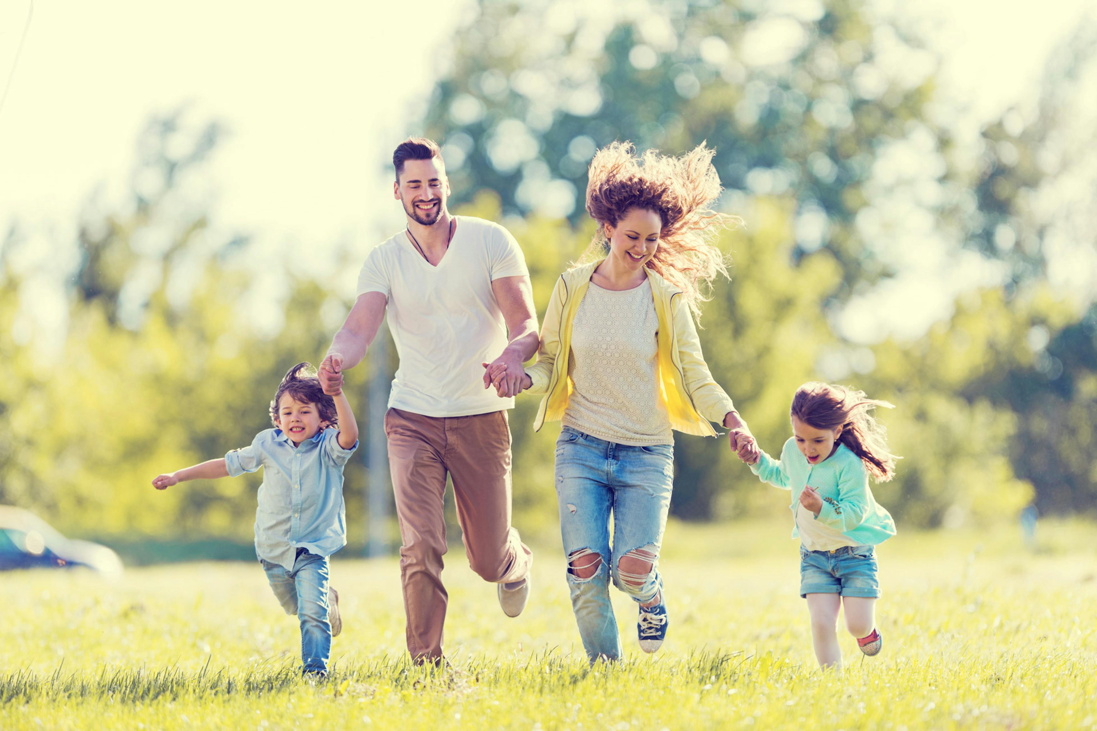 A Happy, Healthy Family Enjoying Sunshine