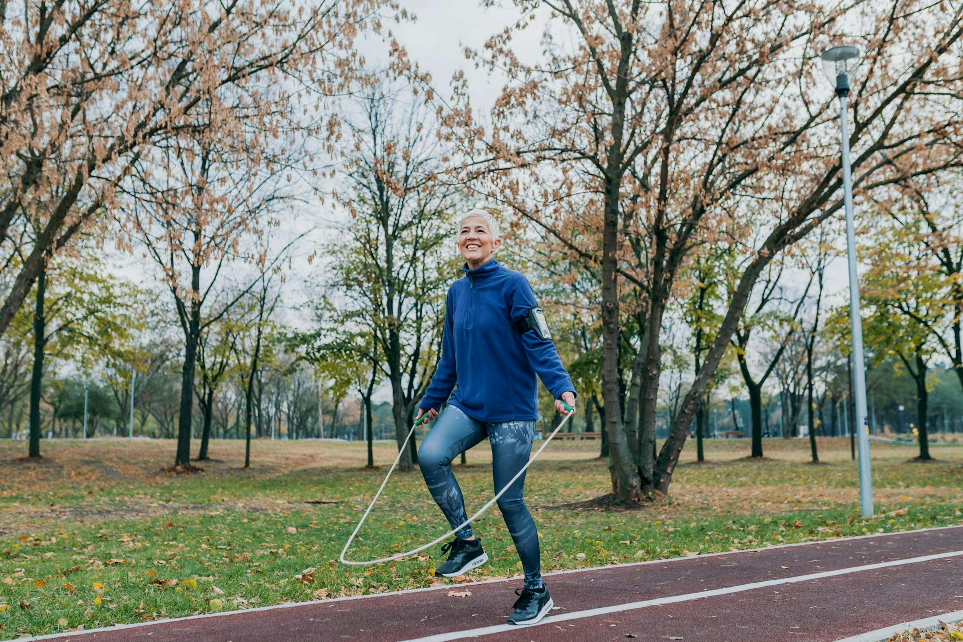 older woman skipping rope