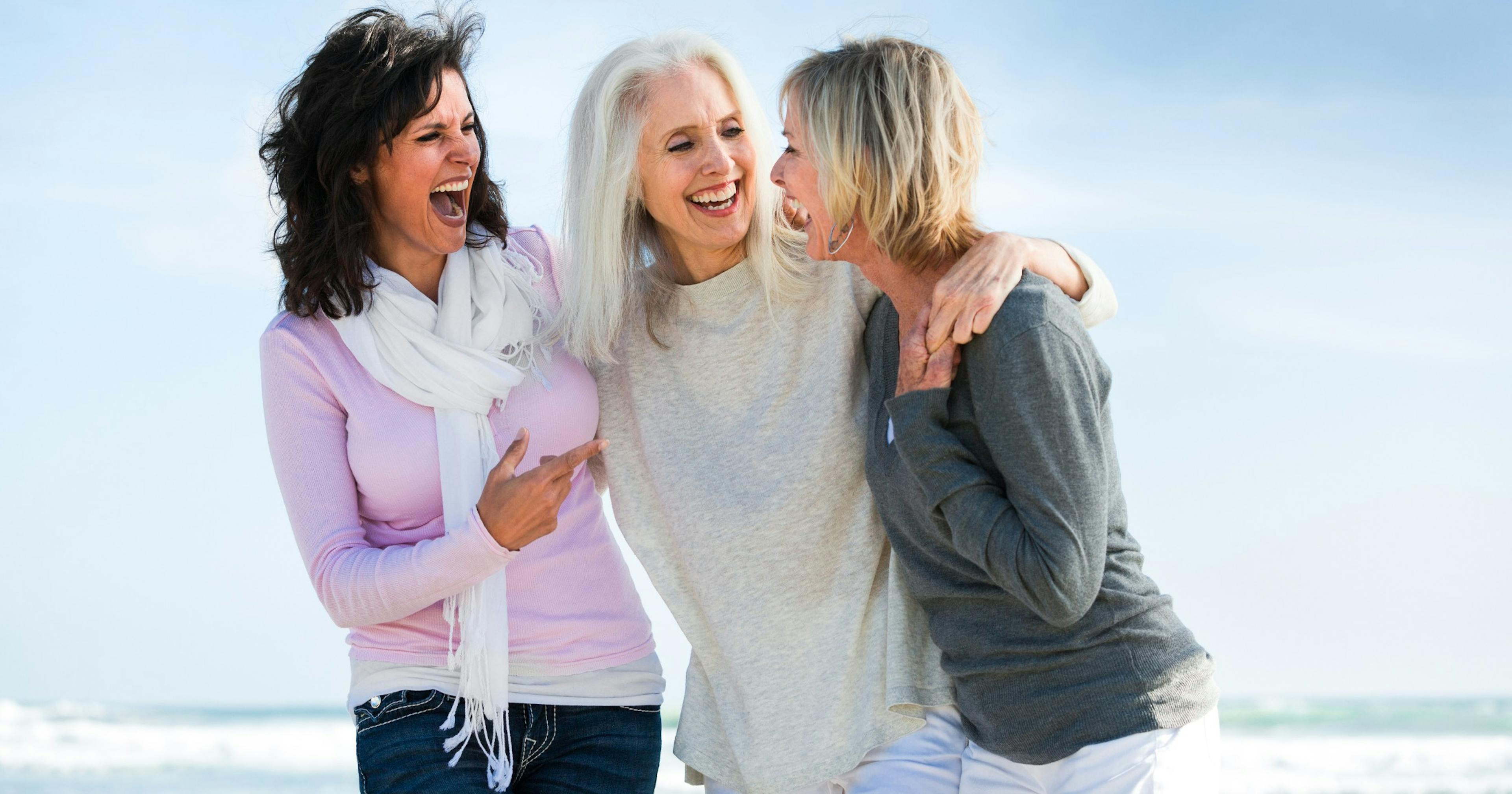 middle age girlfriends on the beach