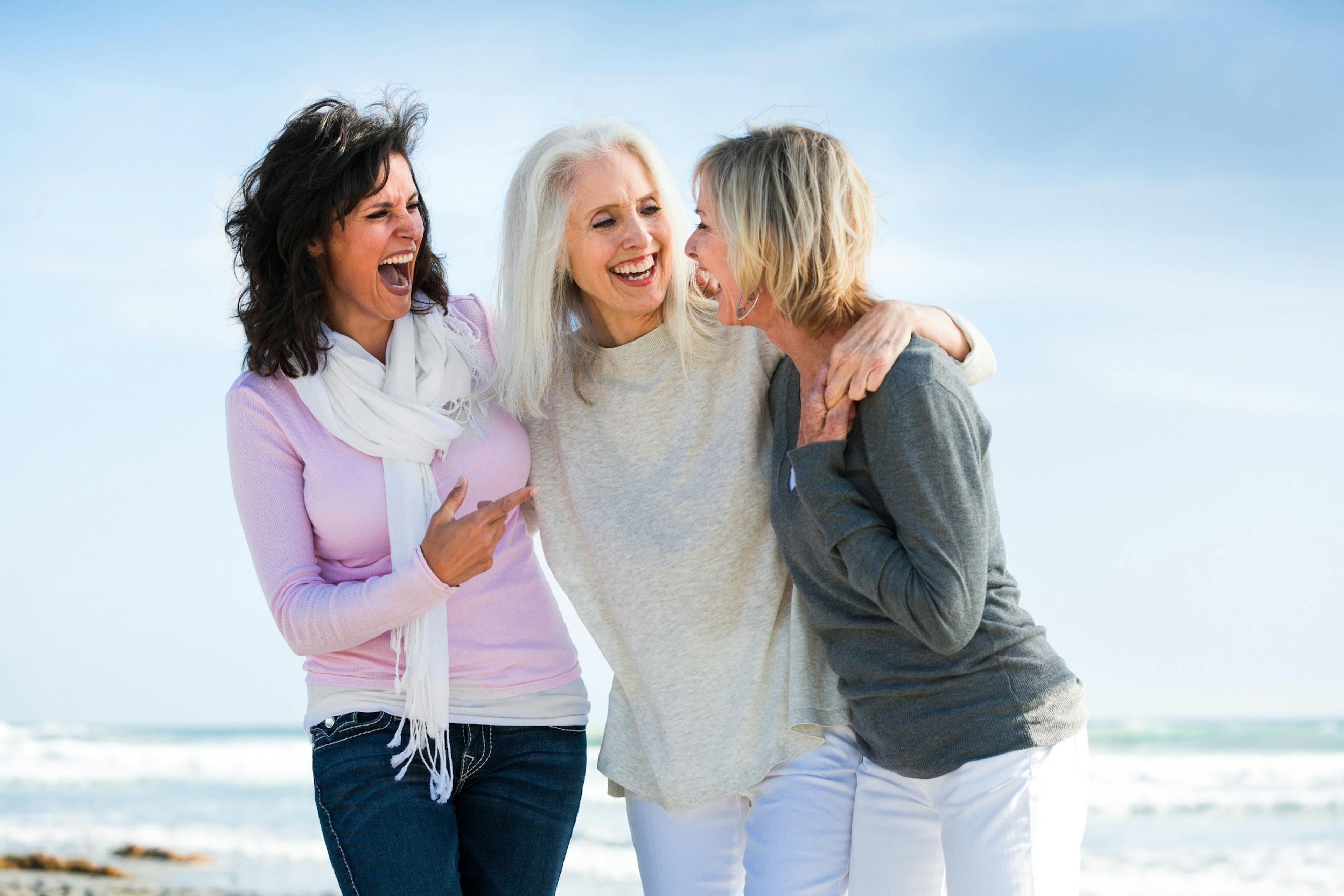 middle age girlfriends on the beach