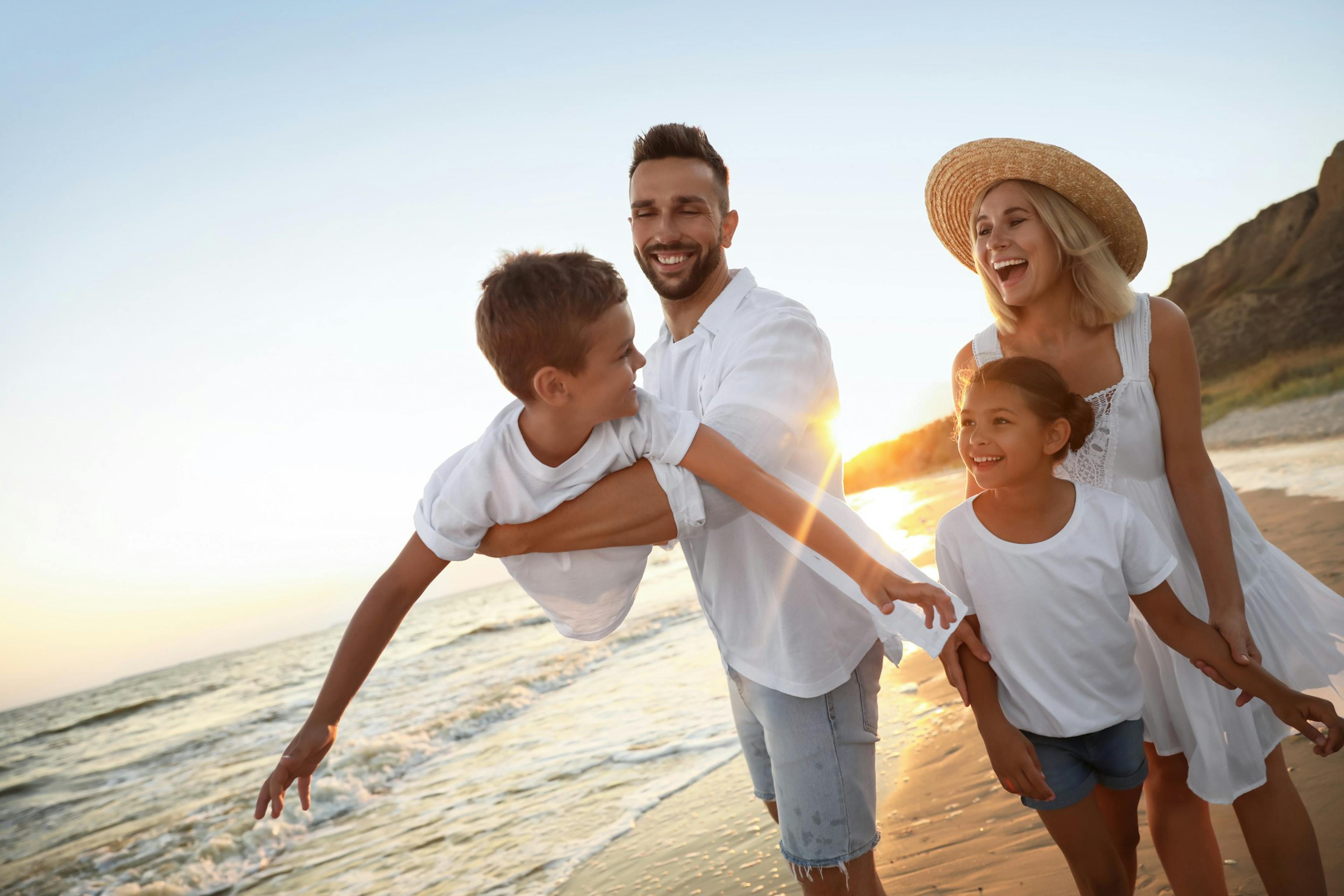 happy healthy family at the beach