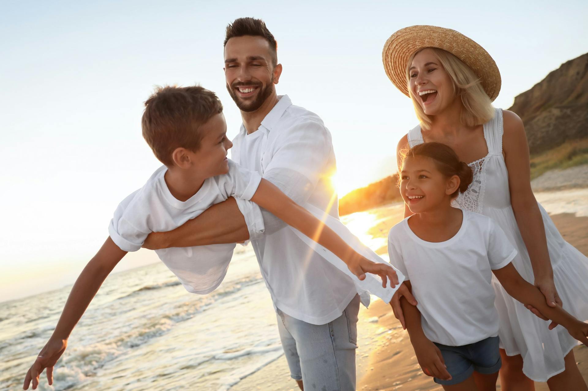 happy healthy family at the beach