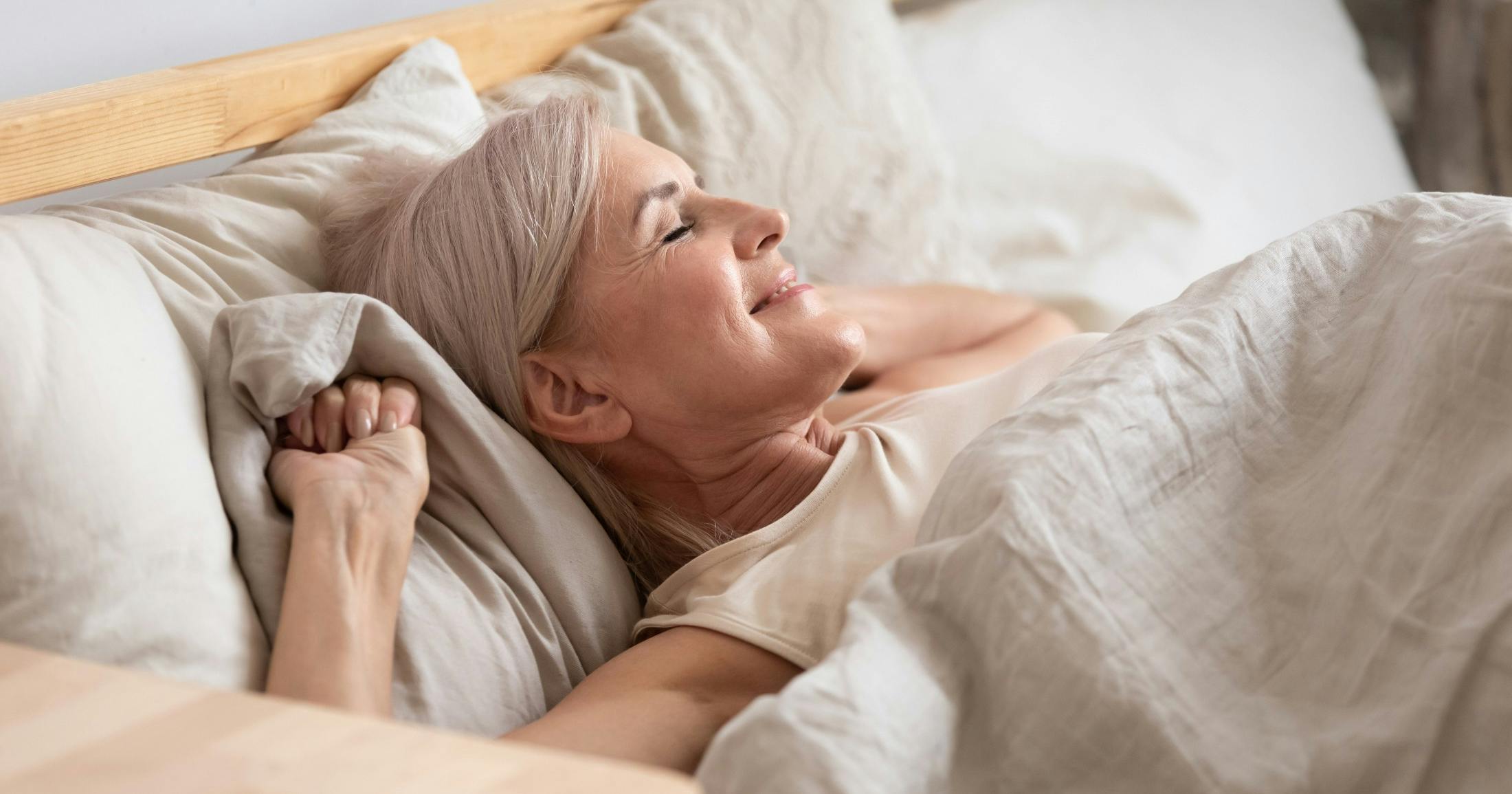 middle age woman waking well-rested