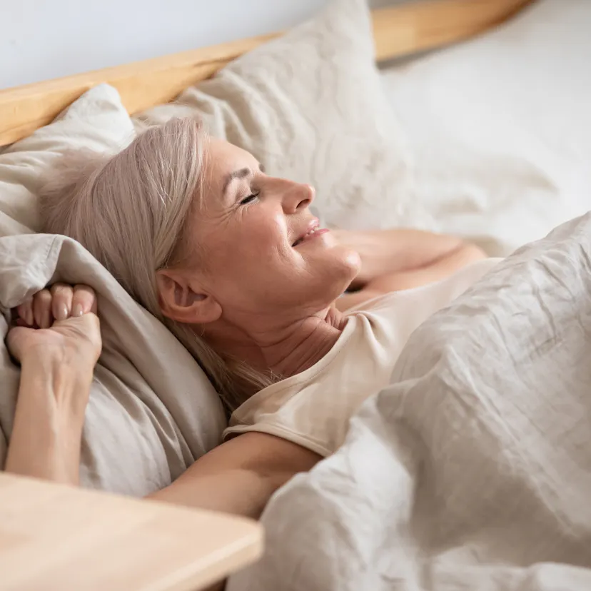 middle age woman waking well-rested