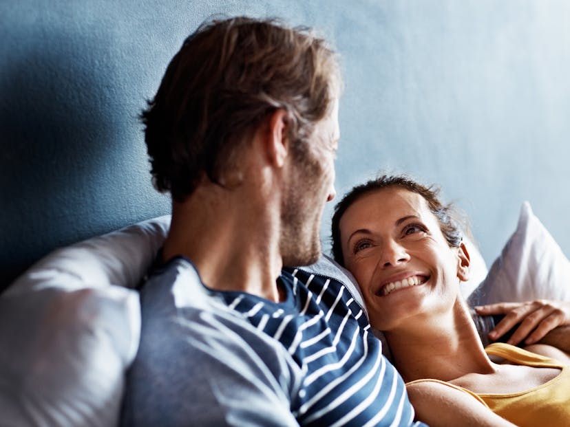 happy couple in bed