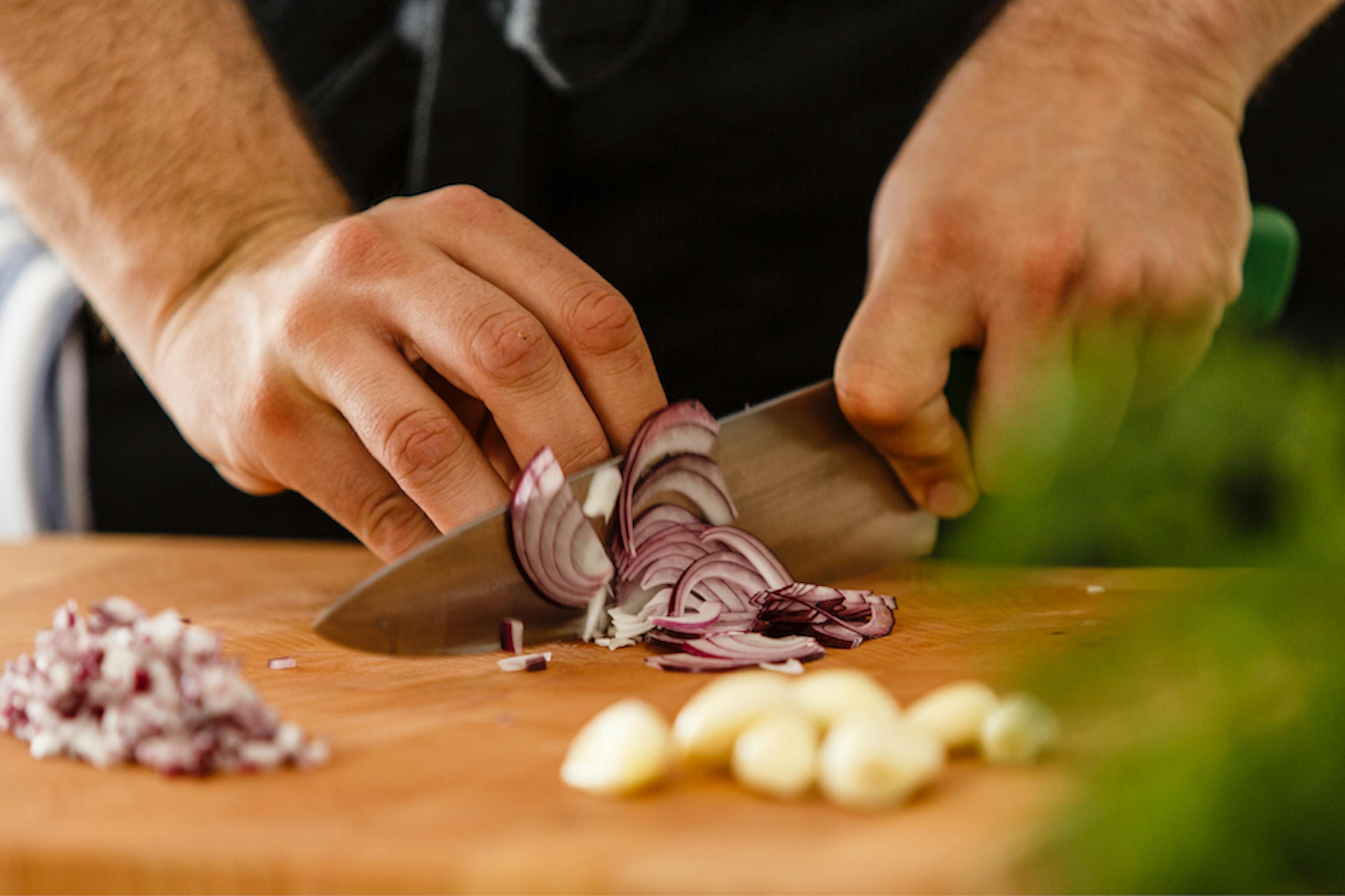 chopping onions and garlic